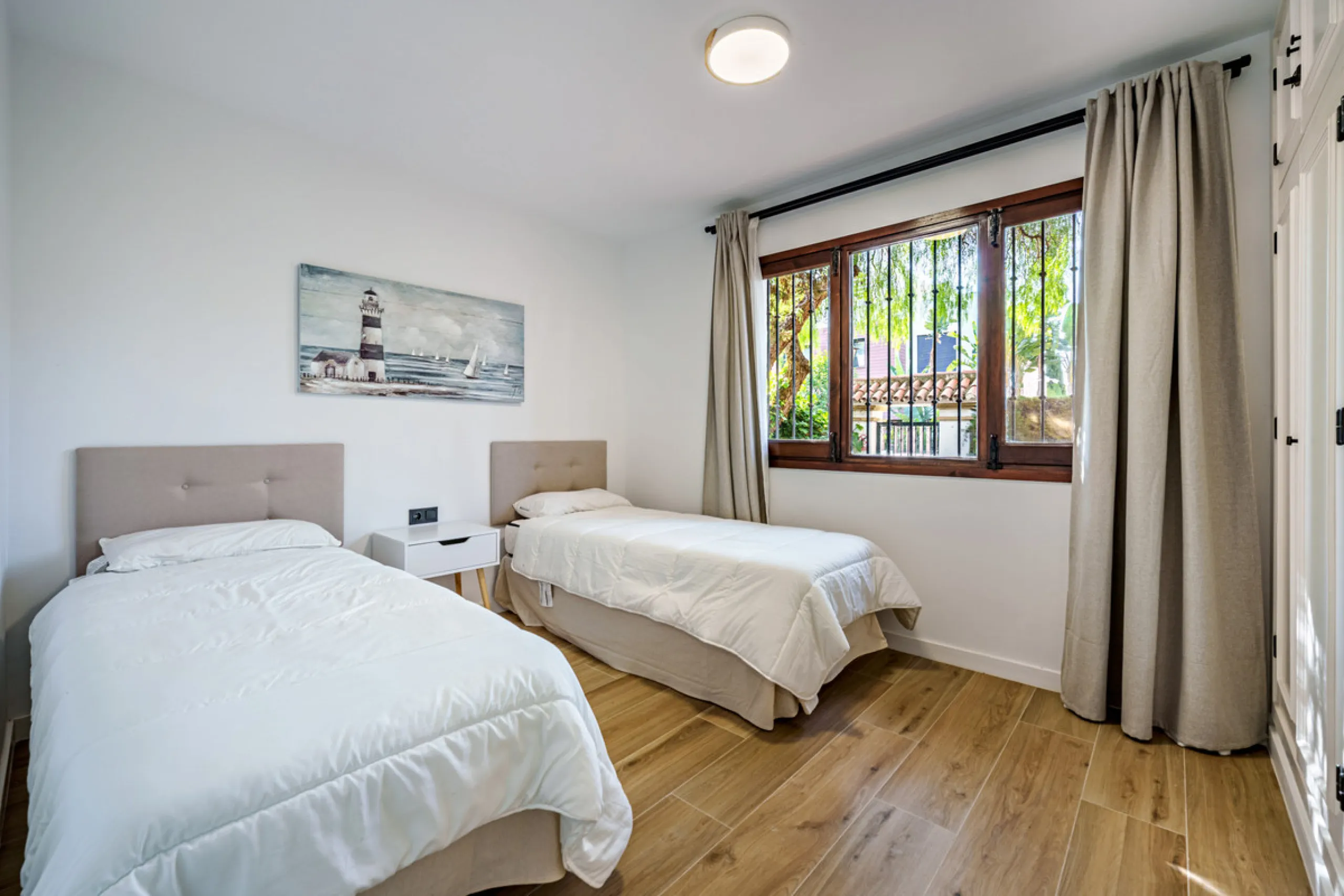 This magnificent ground floor apartment is located in Vivero de Marbella, a quiet, low-rise residential complex in the prestigious Sierra Blanca area on Marbella's Golden Mile, between Imara and Le Blanc. Recently renovated with high-quality materials, th