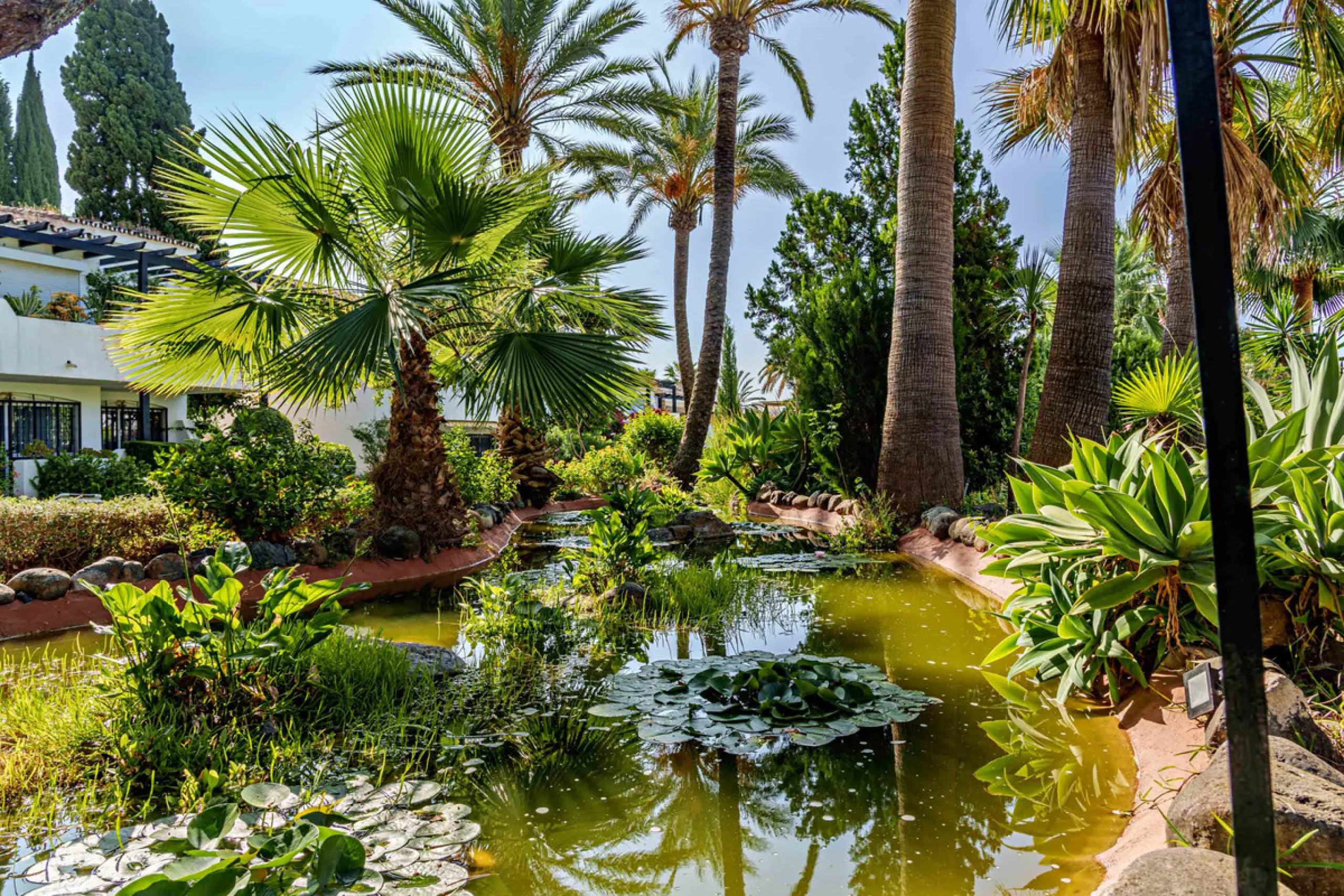 This magnificent ground floor apartment is located in Vivero de Marbella, a quiet, low-rise residential complex in the prestigious Sierra Blanca area on Marbella's Golden Mile, between Imara and Le Blanc. Recently renovated with high-quality materials, th