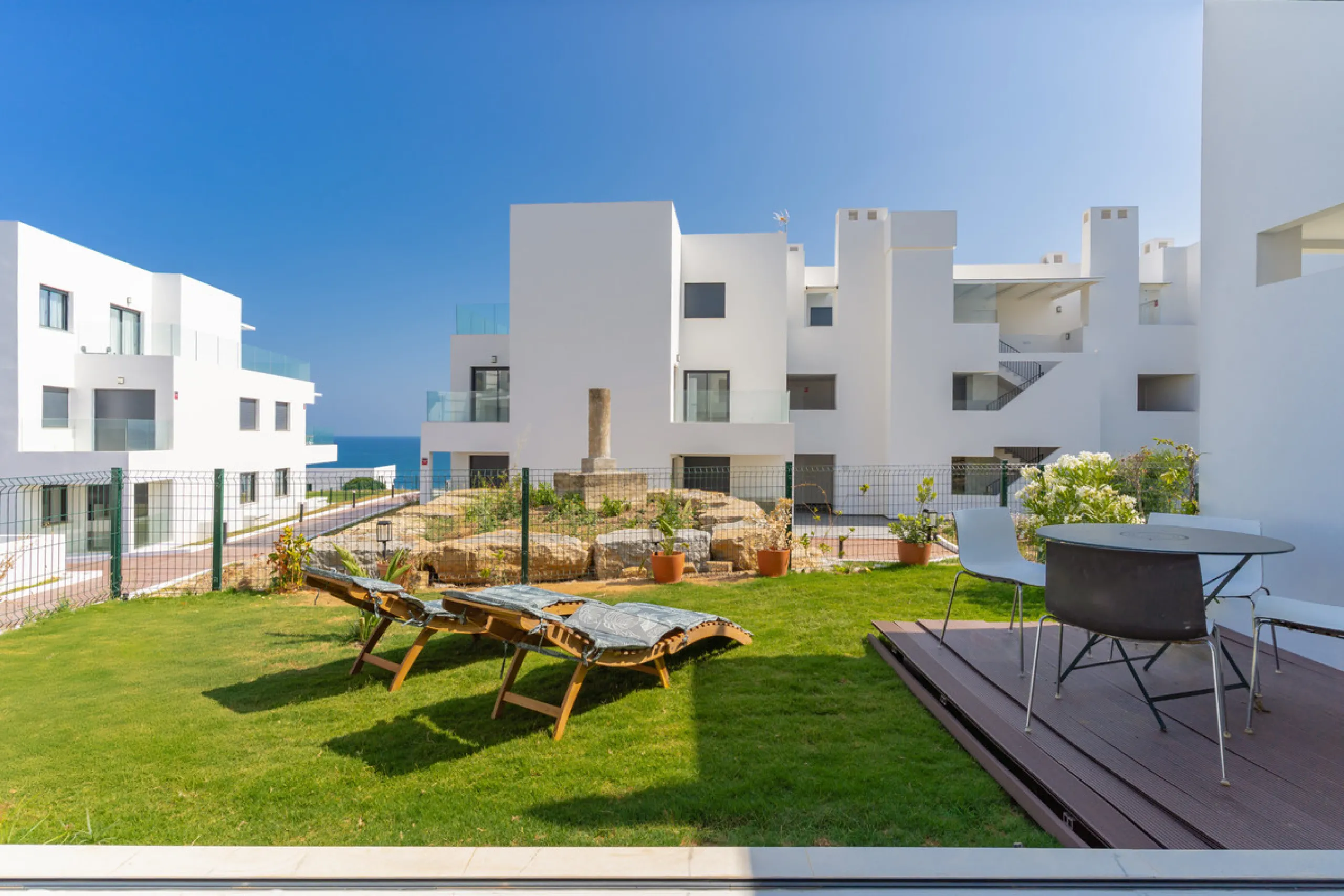 Discover a peaceful coastal retreat in this beautifully designed one-bedroom apartment located in the prestigious Azata del Mar urbanization, Casares. Set in a serene and well-connected area surrounded by lush golf courses, this modern home offers both tr