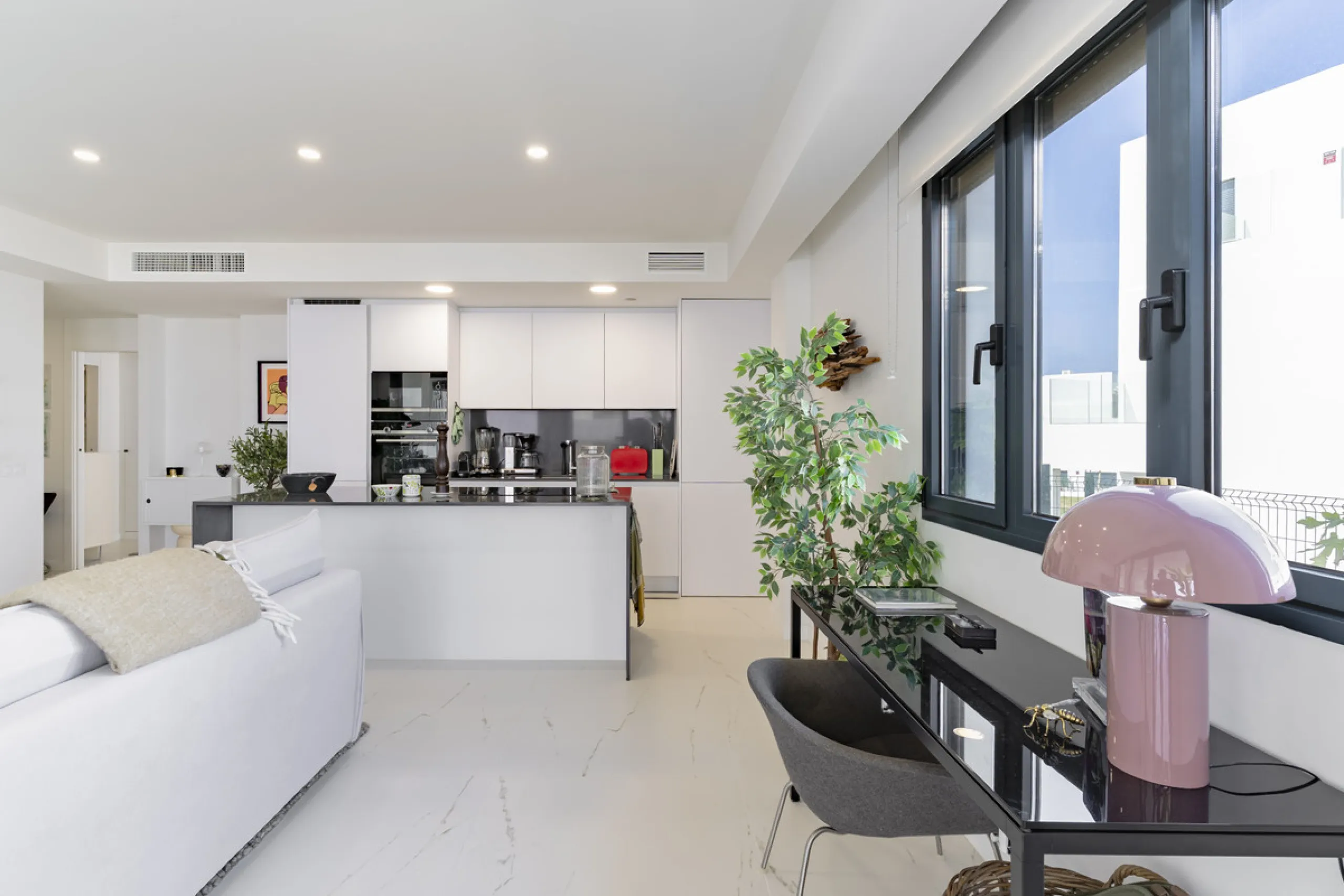 Discover a peaceful coastal retreat in this beautifully designed one-bedroom apartment located in the prestigious Azata del Mar urbanization, Casares. Set in a serene and well-connected area surrounded by lush golf courses, this modern home offers both tr