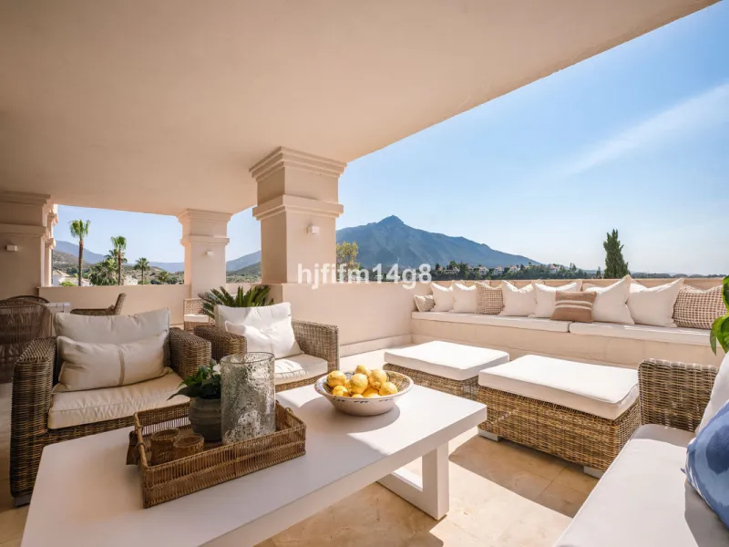This unit is truly one of a kind. 3-bedroom apartment for sale in the prestigious Albatross Hill complex, located in the heart of Nueva Andalucía's Golf Valley. This elegant home offers the perfect blend of luxury, comfort, and convenience—ideal as a perm