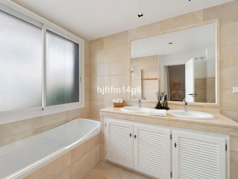 This unit is truly one of a kind. 3-bedroom apartment for sale in the prestigious Albatross Hill complex, located in the heart of Nueva Andalucía's Golf Valley. This elegant home offers the perfect blend of luxury, comfort, and convenience—ideal as a perm