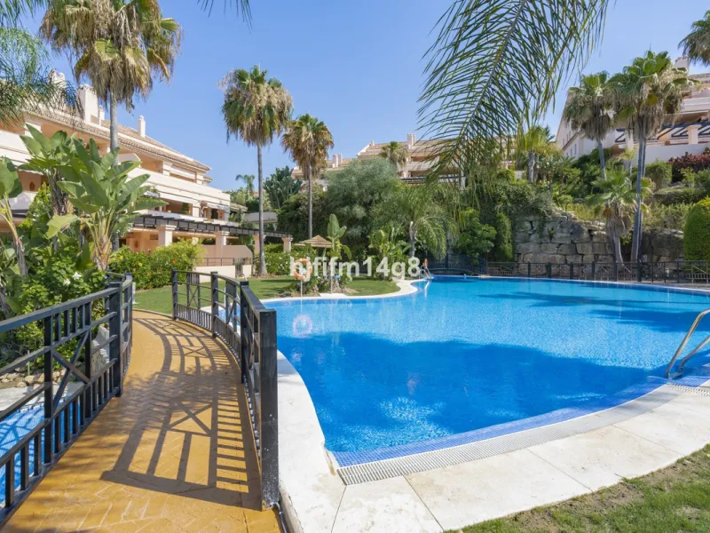 This unit is truly one of a kind. 3-bedroom apartment for sale in the prestigious Albatross Hill complex, located in the heart of Nueva Andalucía's Golf Valley. This elegant home offers the perfect blend of luxury, comfort, and convenience—ideal as a perm