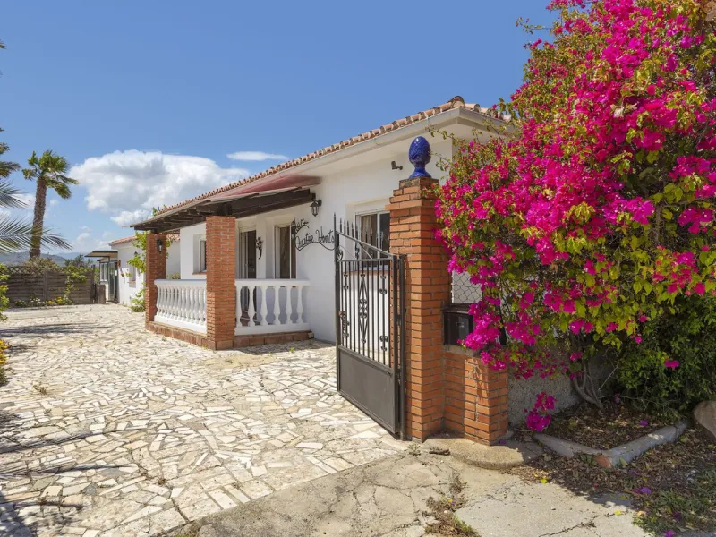 This finca set in an elevated position has impressive mountain views all around it.  The garden is split into different areas each with its own beautiful vibe. Stylish barbecue area by the pool is great for relaxing and welcoming guests.  Main house has t