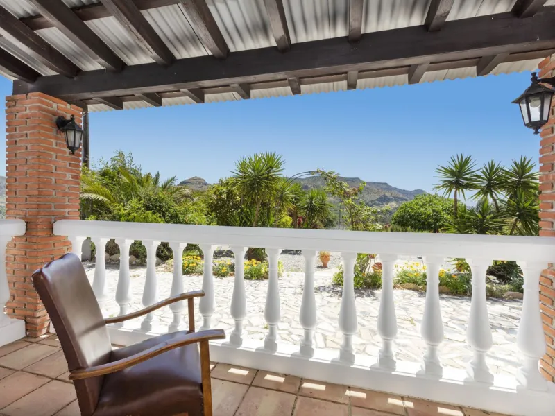 This finca set in an elevated position has impressive mountain views all around it.  The garden is split into different areas each with its own beautiful vibe. Stylish barbecue area by the pool is great for relaxing and welcoming guests.  Main house has t