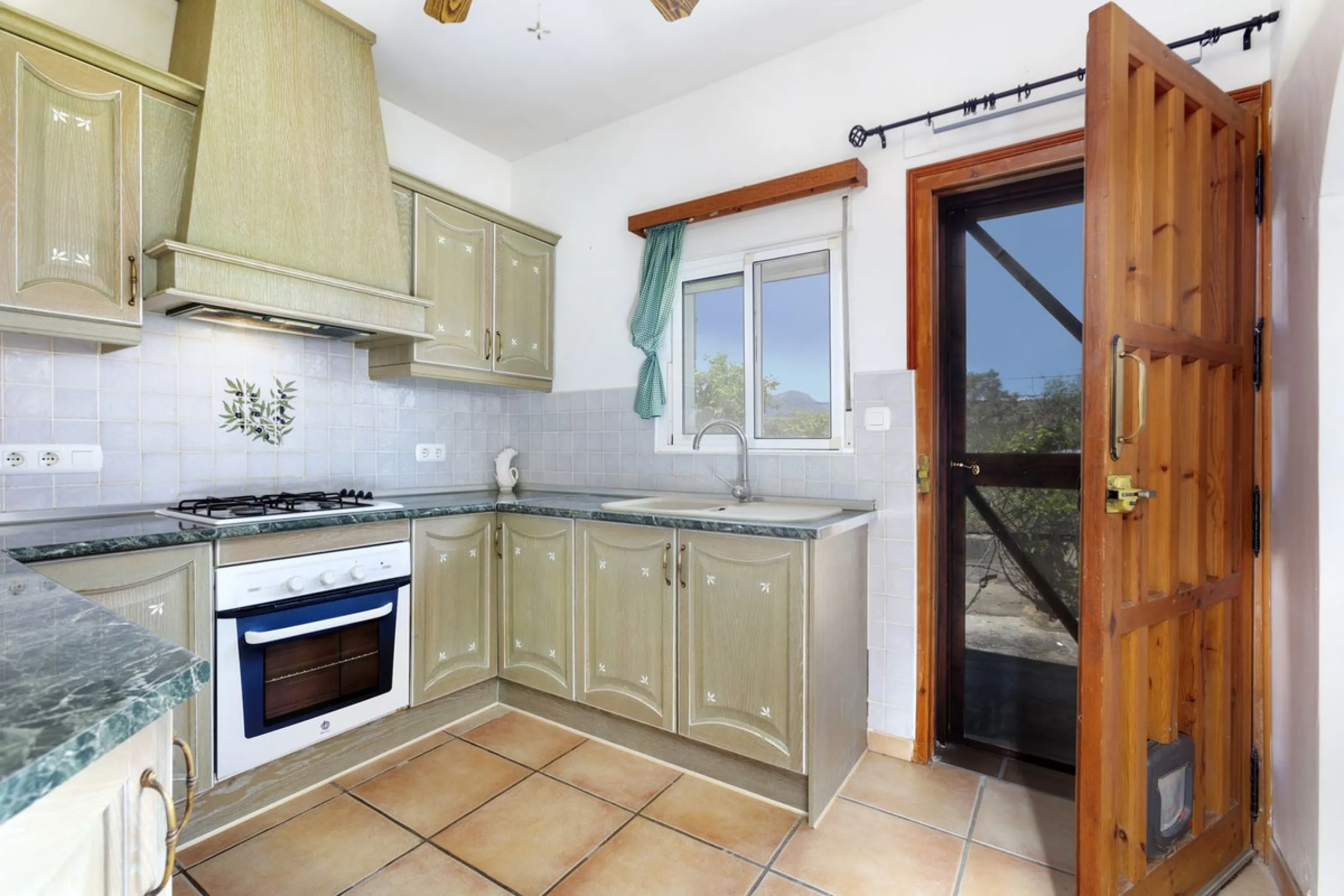 This finca set in an elevated position has impressive mountain views all around it.  The garden is split into different areas each with its own beautiful vibe. Stylish barbecue area by the pool is great for relaxing and welcoming guests.  Main house has t
