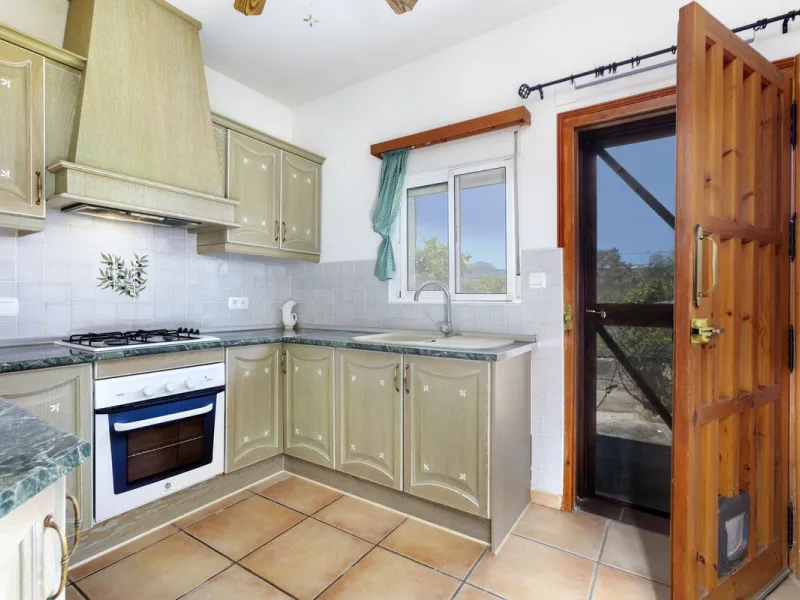 This finca set in an elevated position has impressive mountain views all around it.  The garden is split into different areas each with its own beautiful vibe. Stylish barbecue area by the pool is great for relaxing and welcoming guests.  Main house has t