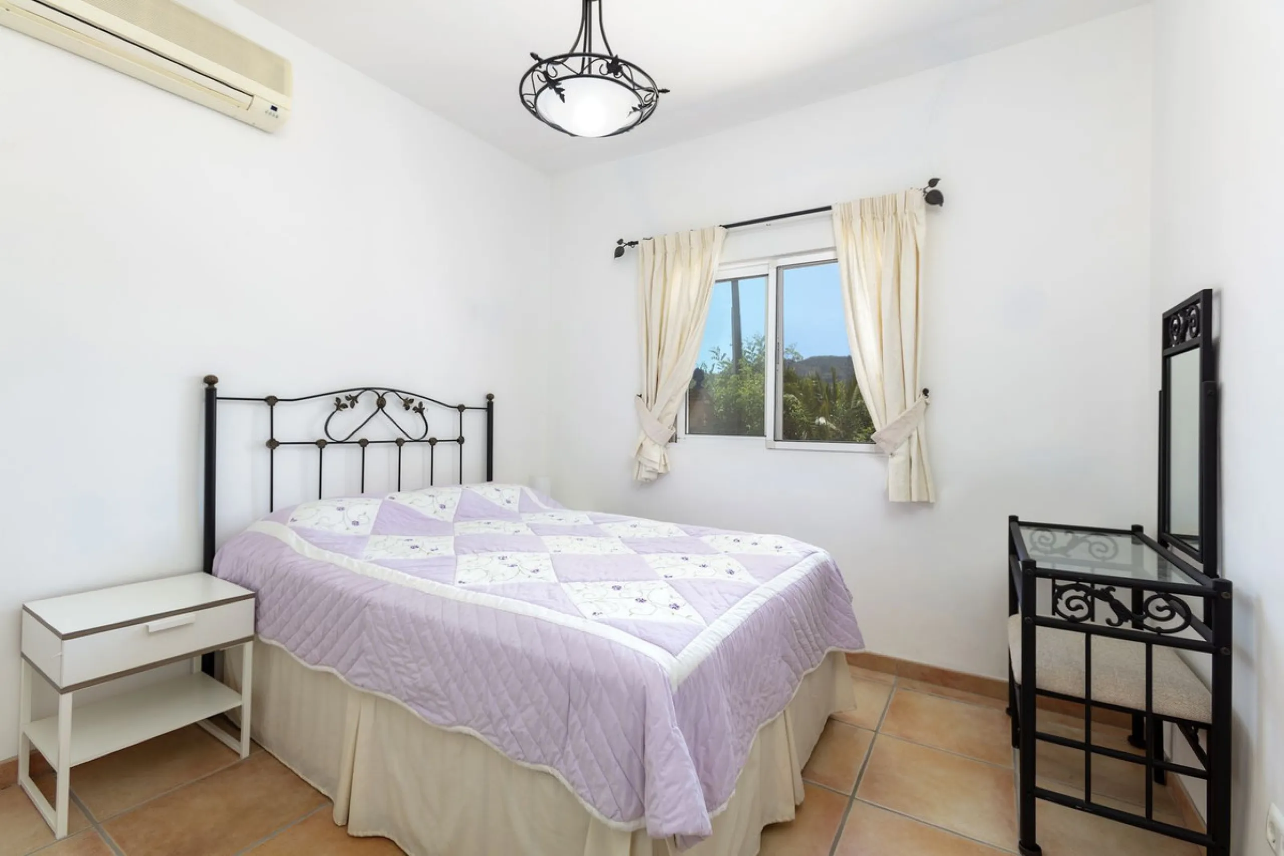 This finca set in an elevated position has impressive mountain views all around it.  The garden is split into different areas each with its own beautiful vibe. Stylish barbecue area by the pool is great for relaxing and welcoming guests.  Main house has t