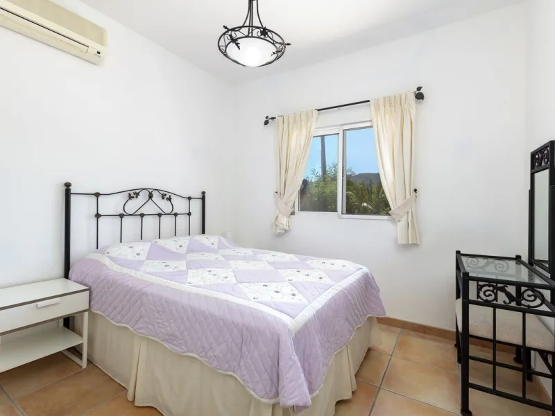 This finca set in an elevated position has impressive mountain views all around it.  The garden is split into different areas each with its own beautiful vibe. Stylish barbecue area by the pool is great for relaxing and welcoming guests.  Main house has t