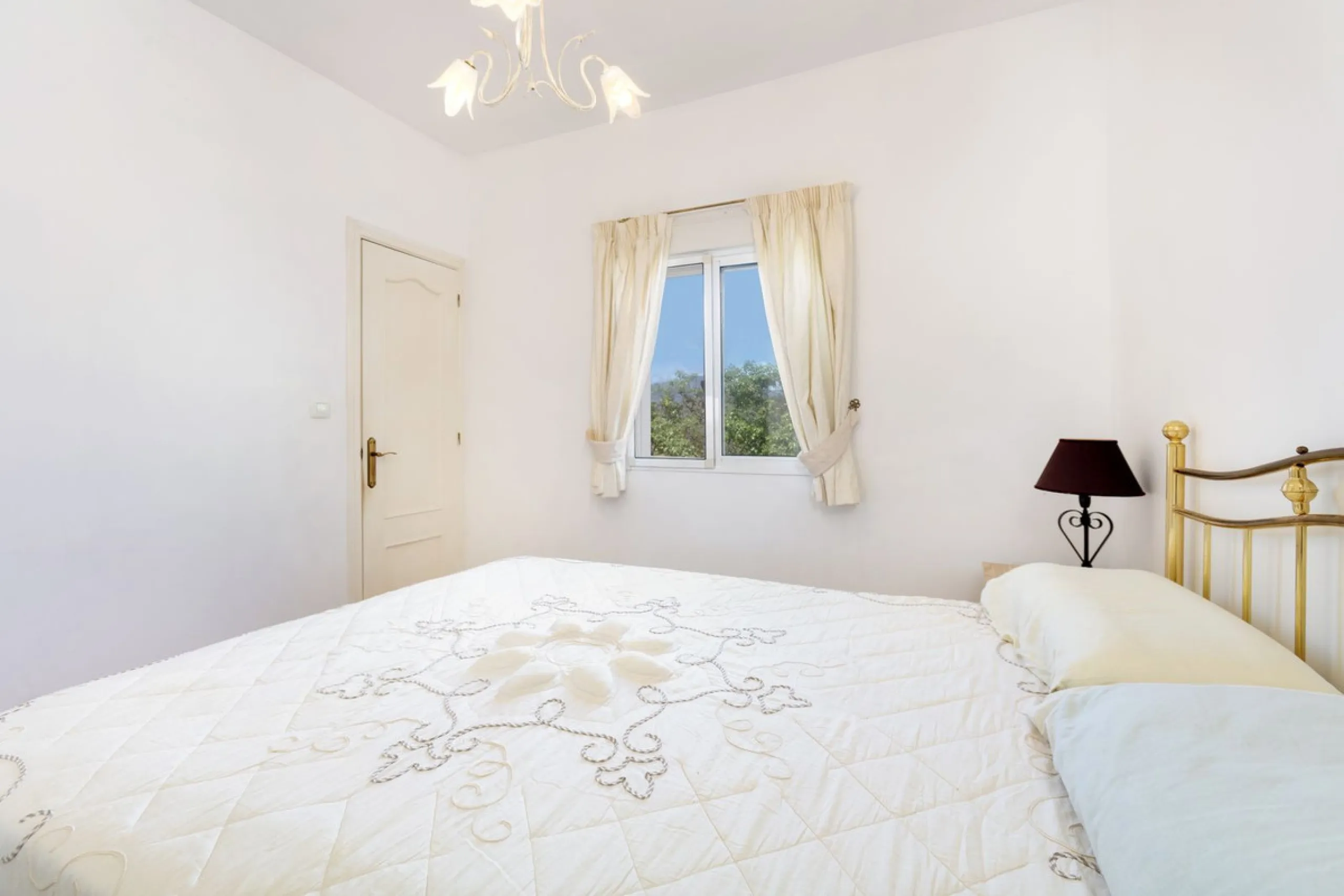 This finca set in an elevated position has impressive mountain views all around it.  The garden is split into different areas each with its own beautiful vibe. Stylish barbecue area by the pool is great for relaxing and welcoming guests.  Main house has t