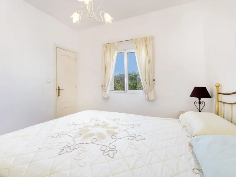 This finca set in an elevated position has impressive mountain views all around it.  The garden is split into different areas each with its own beautiful vibe. Stylish barbecue area by the pool is great for relaxing and welcoming guests.  Main house has t