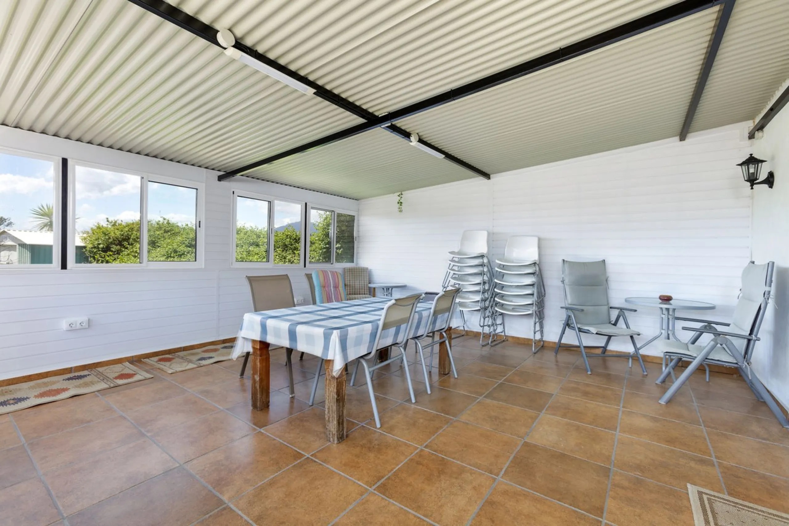 This finca set in an elevated position has impressive mountain views all around it.  The garden is split into different areas each with its own beautiful vibe. Stylish barbecue area by the pool is great for relaxing and welcoming guests.  Main house has t