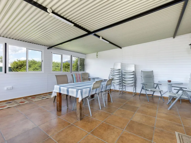 This finca set in an elevated position has impressive mountain views all around it.  The garden is split into different areas each with its own beautiful vibe. Stylish barbecue area by the pool is great for relaxing and welcoming guests.  Main house has t