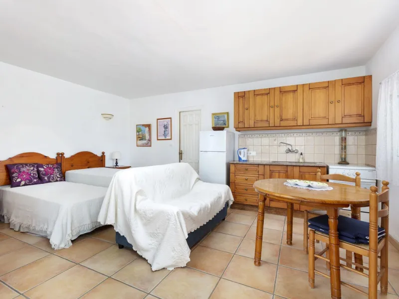 This finca set in an elevated position has impressive mountain views all around it.  The garden is split into different areas each with its own beautiful vibe. Stylish barbecue area by the pool is great for relaxing and welcoming guests.  Main house has t