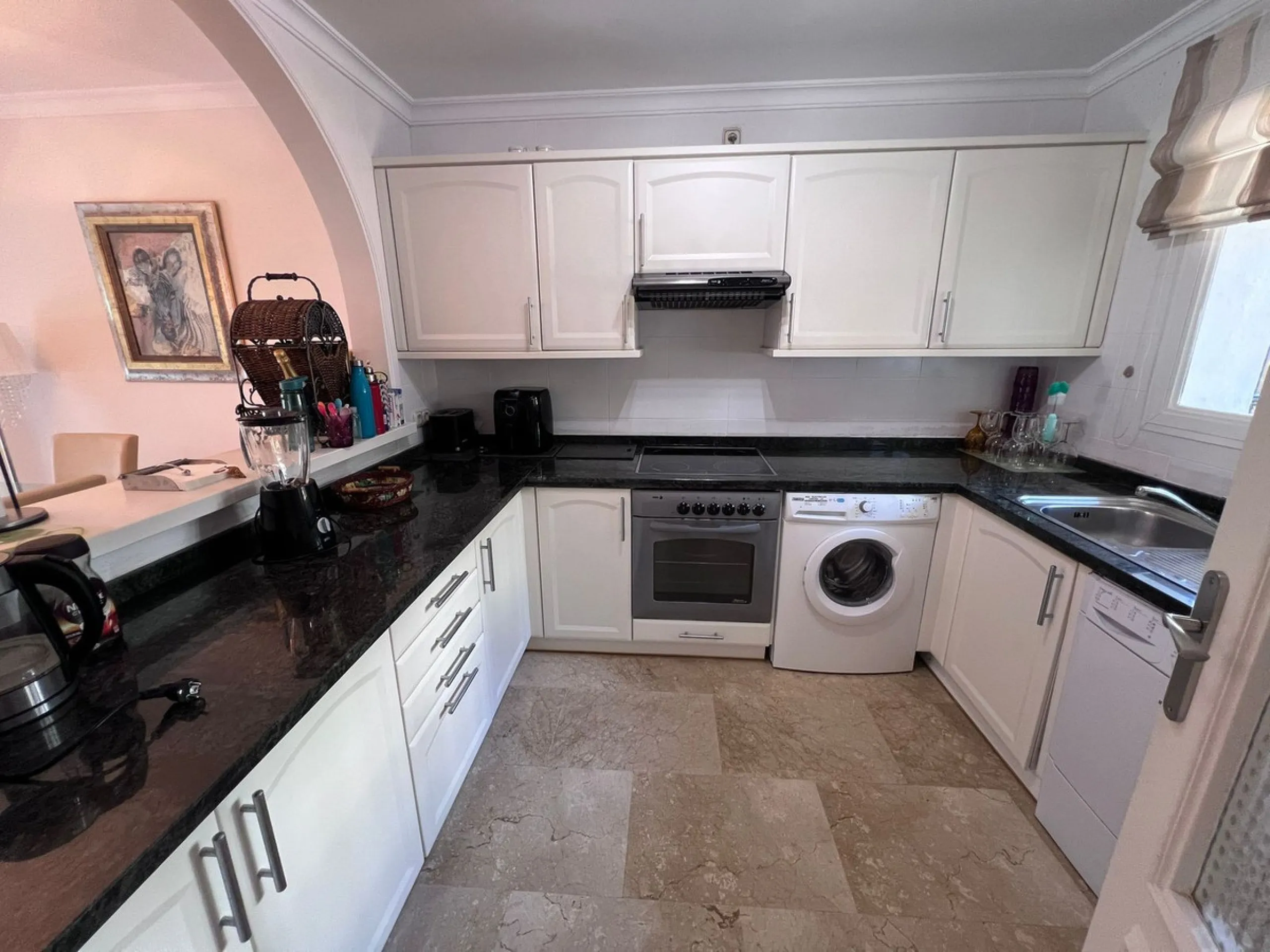 Delightful three bedroom, two bathroom (plus cloakroom) townhouse in much sought after area.