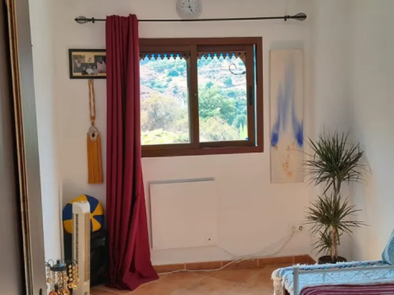 Charming Multi-Level Property with Panoramic Mountain Views in Tolox