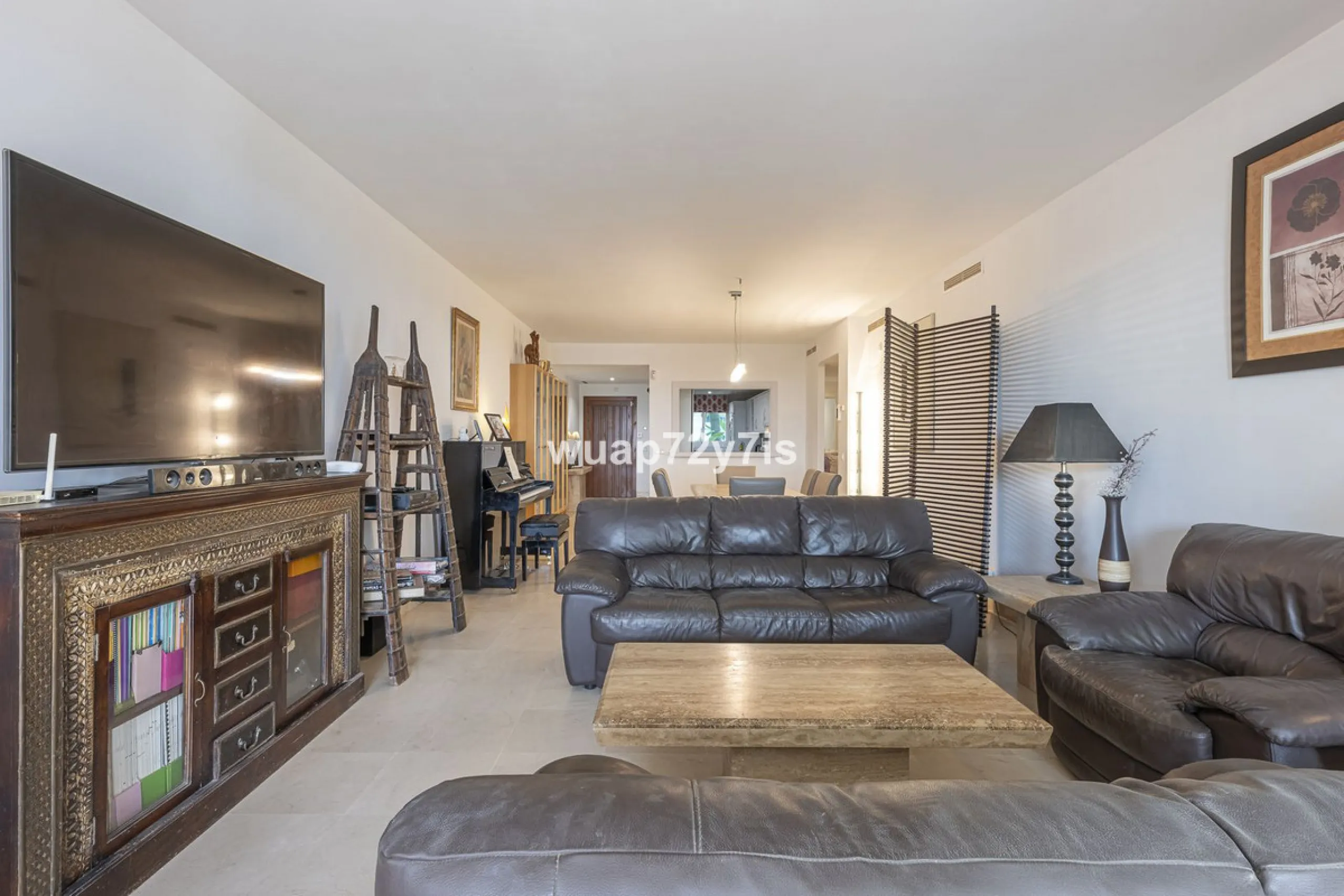 Charming Elevated Ground Floor 3-Bedroom Apartment with Sea and Garden Views – Nueva Andalucía