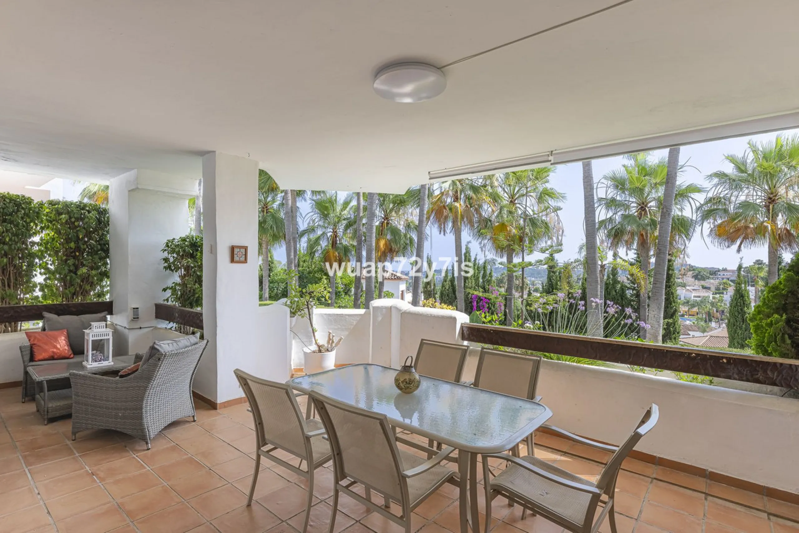 Charming Elevated Ground Floor 3-Bedroom Apartment with Sea and Garden Views – Nueva Andalucía