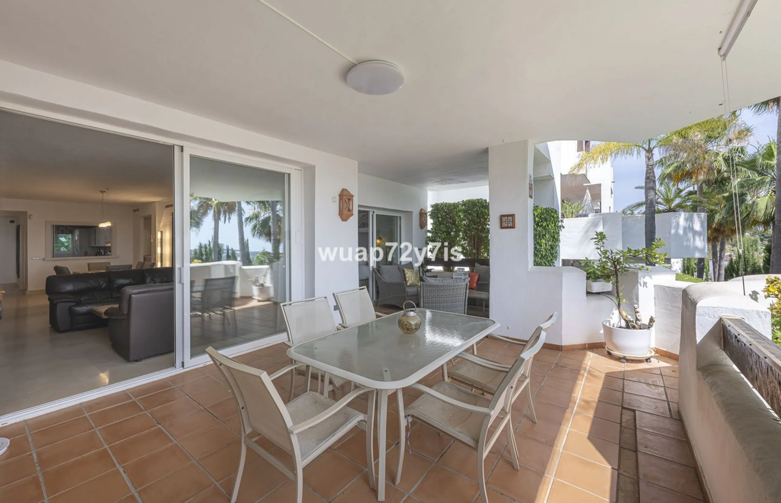 Charming Elevated Ground Floor 3-Bedroom Apartment with Sea and Garden Views – Nueva Andalucía