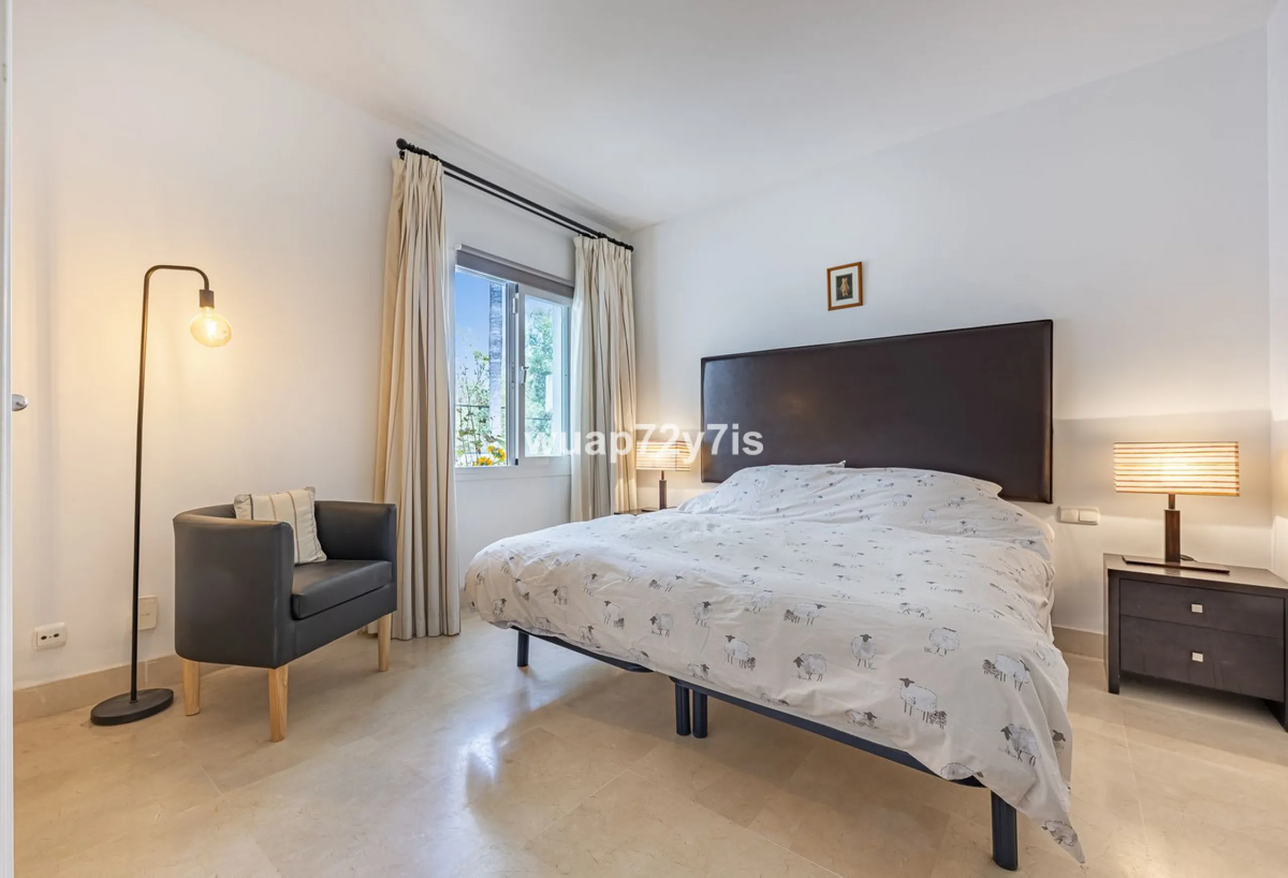 Charming Elevated Ground Floor 3-Bedroom Apartment with Sea and Garden Views – Nueva Andalucía