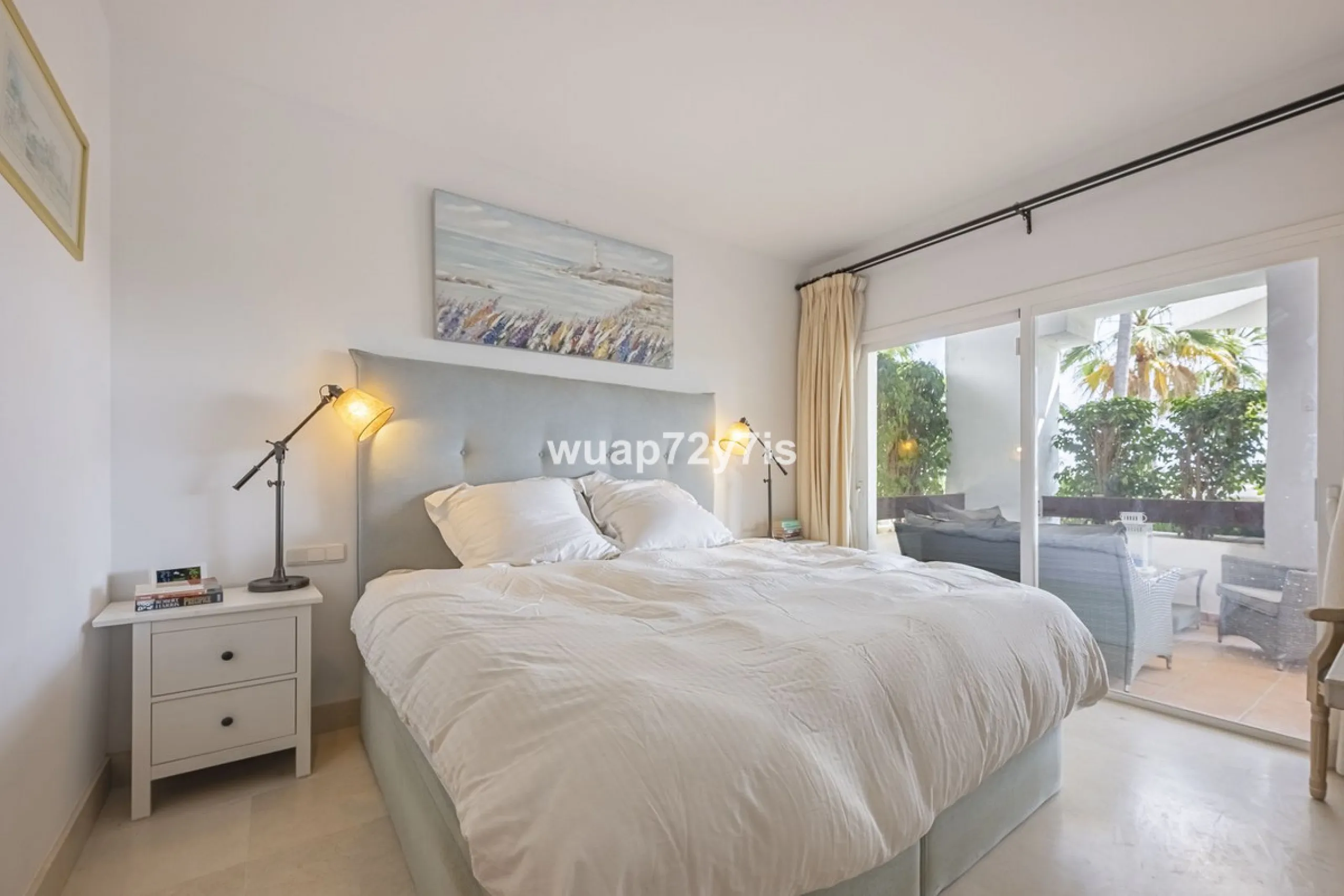 Charming Elevated Ground Floor 3-Bedroom Apartment with Sea and Garden Views – Nueva Andalucía