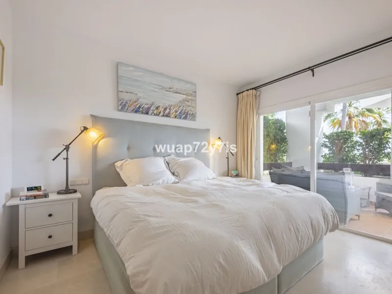 Charming Elevated Ground Floor 3-Bedroom Apartment with Sea and Garden Views – Nueva Andalucía