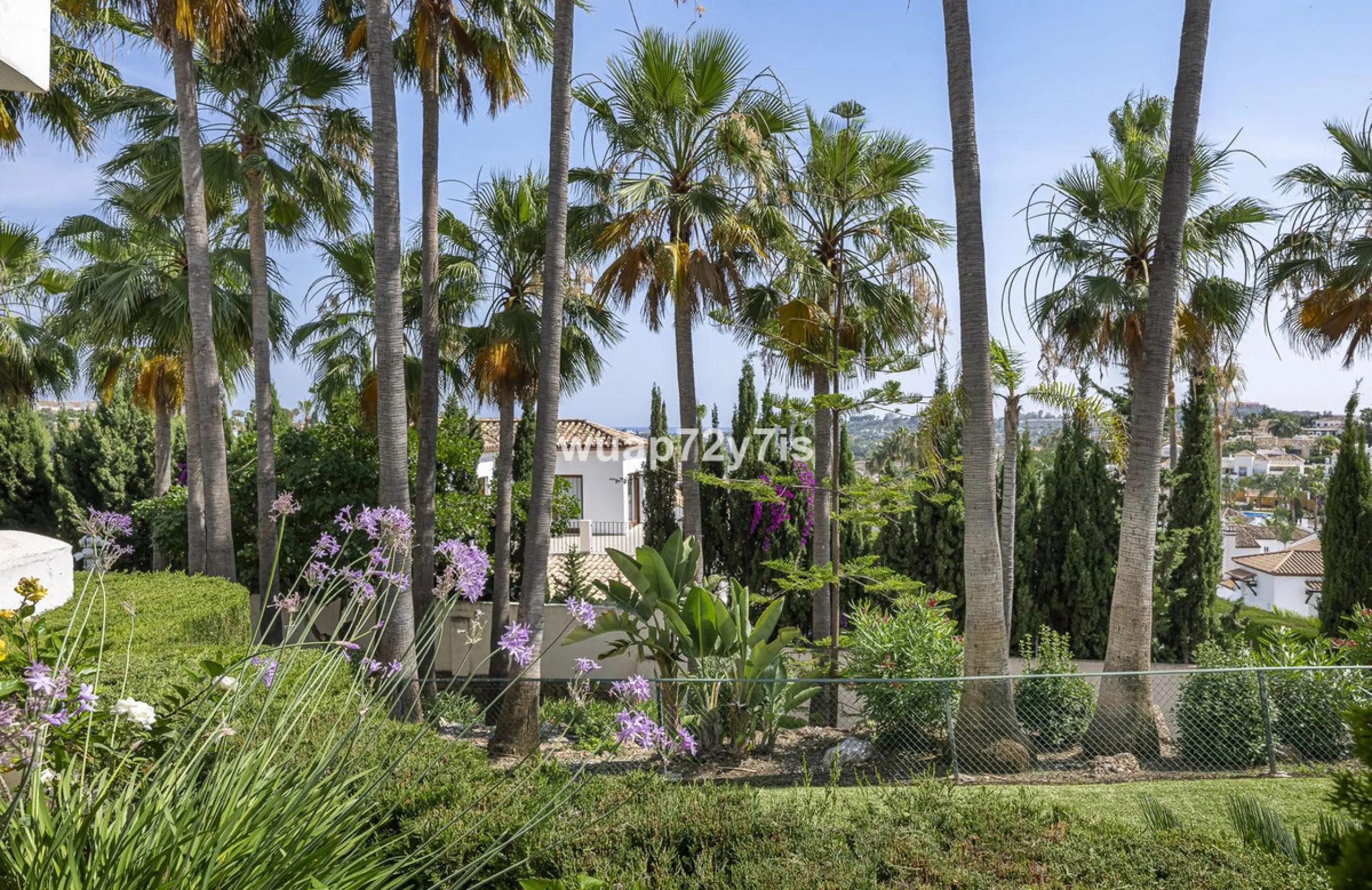 Charming Elevated Ground Floor 3-Bedroom Apartment with Sea and Garden Views – Nueva Andalucía