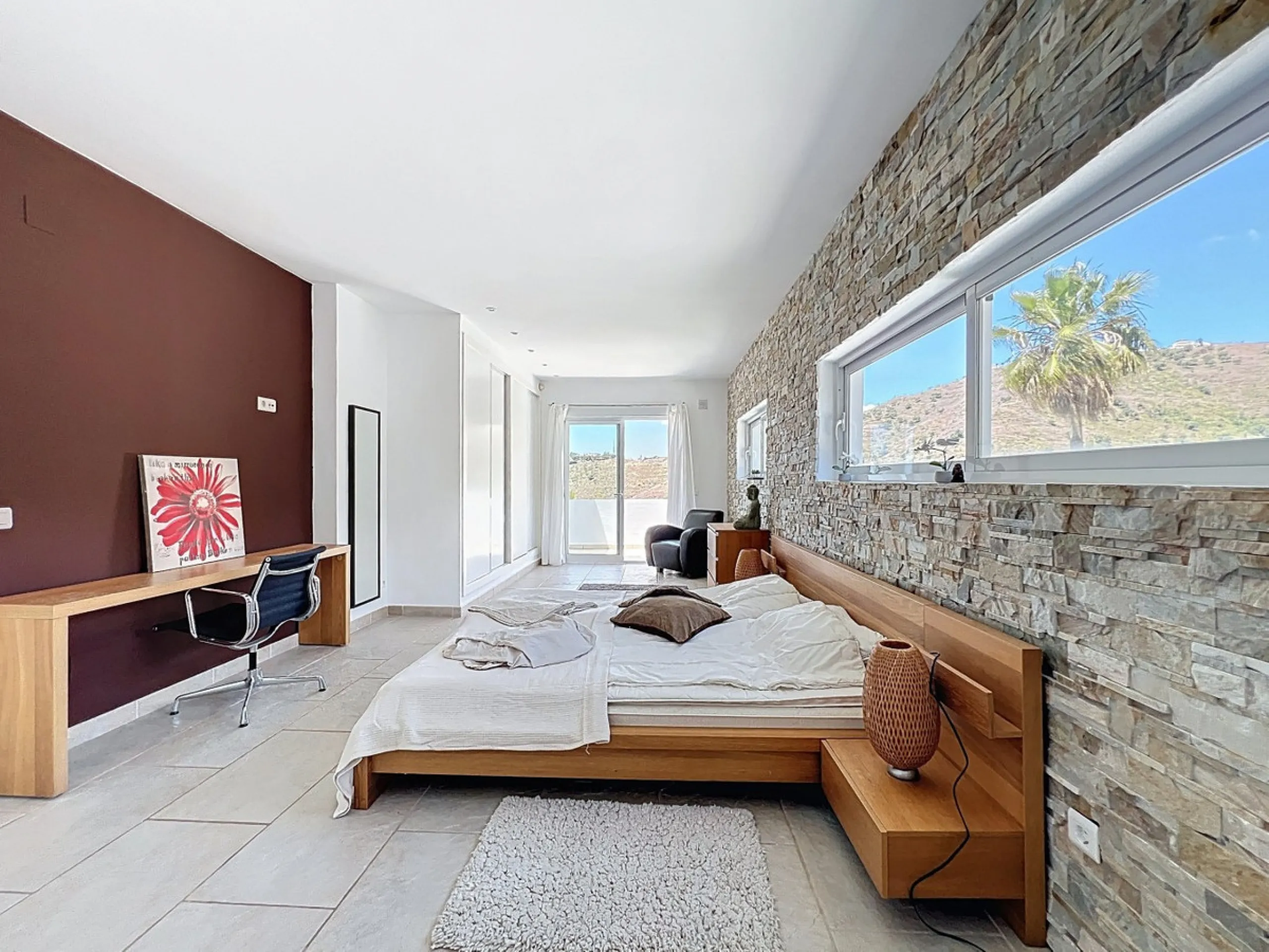 This impressive villa in Málaga, Spain, offers a harmonious blend of space, luxury, and modern design. Spanning 395.8 m2 across two floors, the property boasts 7 bedrooms and 5 bathrooms, making it ideal for large families or those who love to entertain. 