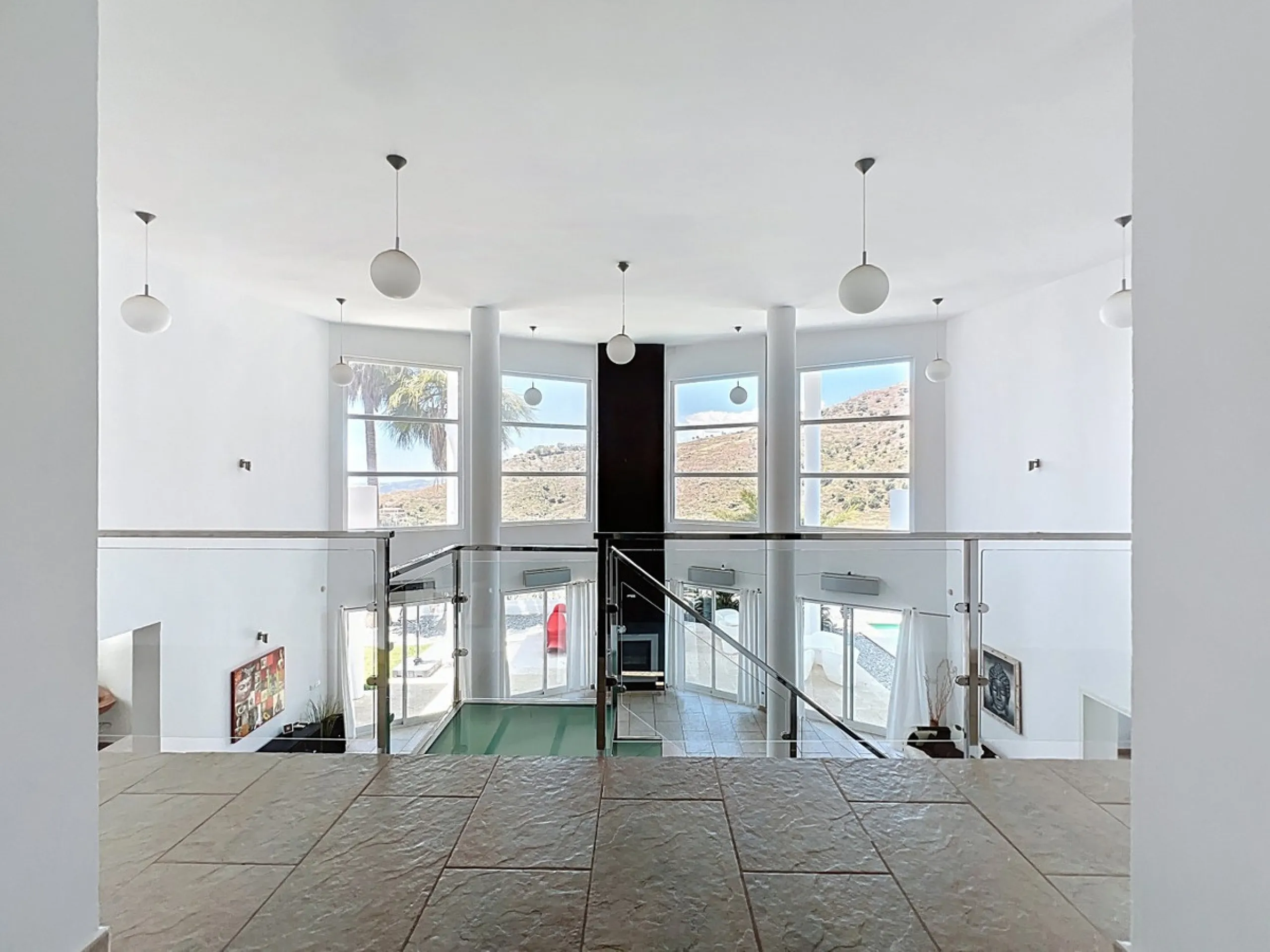 This impressive villa in Málaga, Spain, offers a harmonious blend of space, luxury, and modern design. Spanning 395.8 m2 across two floors, the property boasts 7 bedrooms and 5 bathrooms, making it ideal for large families or those who love to entertain. 