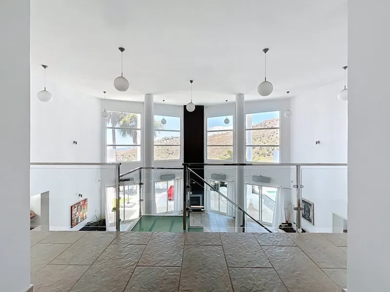 This impressive villa in Málaga, Spain, offers a harmonious blend of space, luxury, and modern design. Spanning 395.8 m2 across two floors, the property boasts 7 bedrooms and 5 bathrooms, making it ideal for large families or those who love to entertain. 