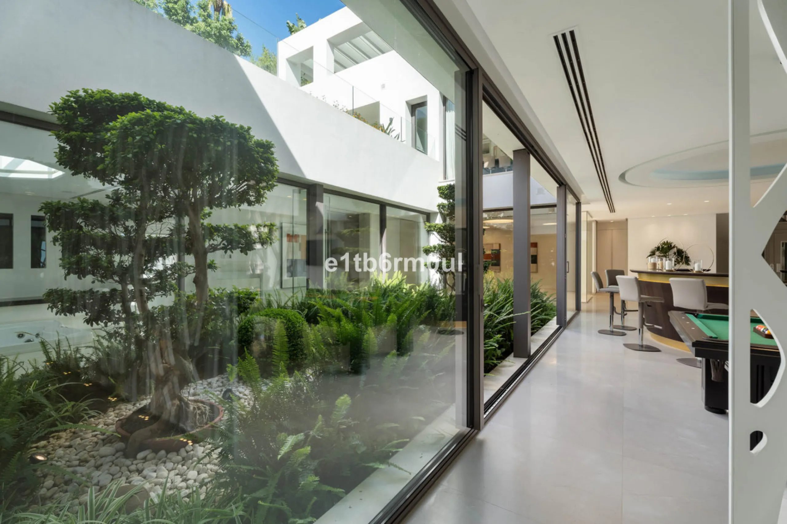 Experience the pinnacle of modern Mediterranean architecture with this brand-new designer villa nestled in the prestigious La Quinta residential enclave of Benahavís. Offering breathtaking panoramic sea and golf course views, this exquisitely crafted home