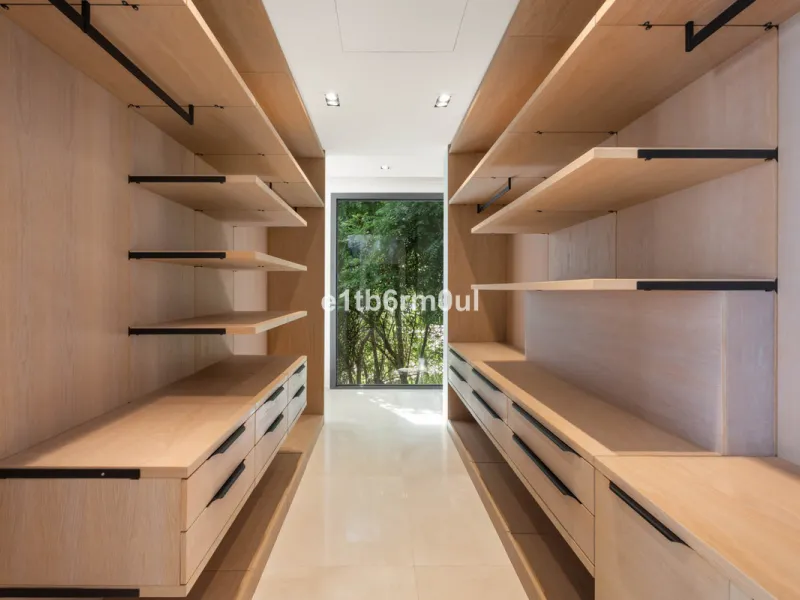 Experience the pinnacle of modern Mediterranean architecture with this brand-new designer villa nestled in the prestigious La Quinta residential enclave of Benahavís. Offering breathtaking panoramic sea and golf course views, this exquisitely crafted home
