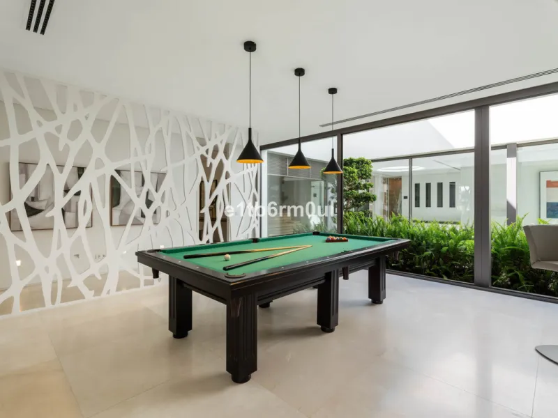 Experience the pinnacle of modern Mediterranean architecture with this brand-new designer villa nestled in the prestigious La Quinta residential enclave of Benahavís. Offering breathtaking panoramic sea and golf course views, this exquisitely crafted home