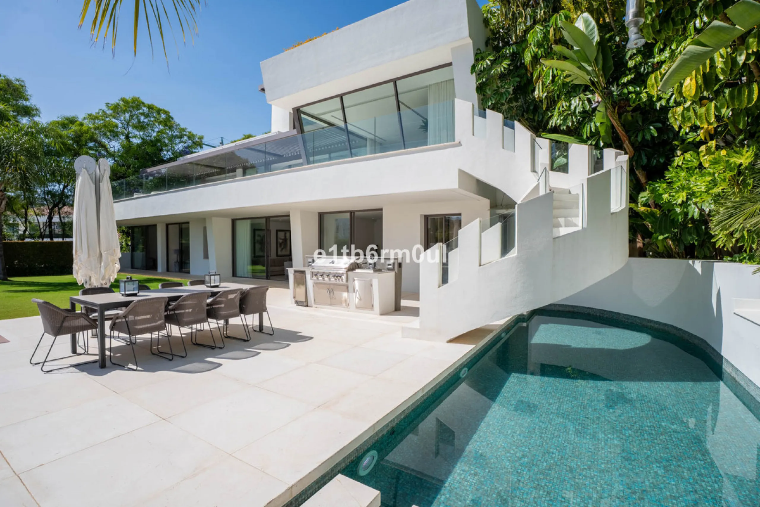 Experience the pinnacle of modern Mediterranean architecture with this brand-new designer villa nestled in the prestigious La Quinta residential enclave of Benahavís. Offering breathtaking panoramic sea and golf course views, this exquisitely crafted home