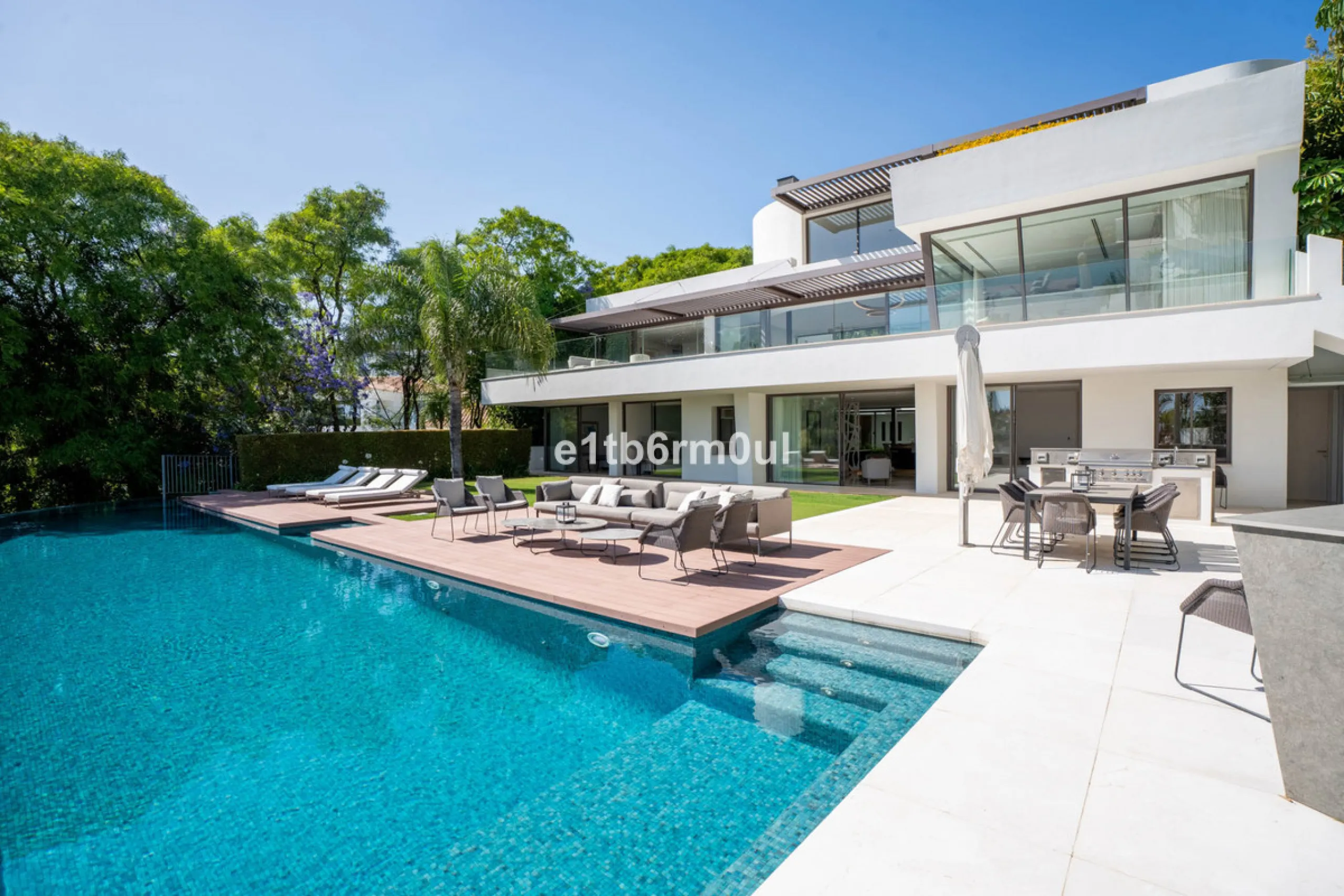 Experience the pinnacle of modern Mediterranean architecture with this brand-new designer villa nestled in the prestigious La Quinta residential enclave of Benahavís. Offering breathtaking panoramic sea and golf course views, this exquisitely crafted home