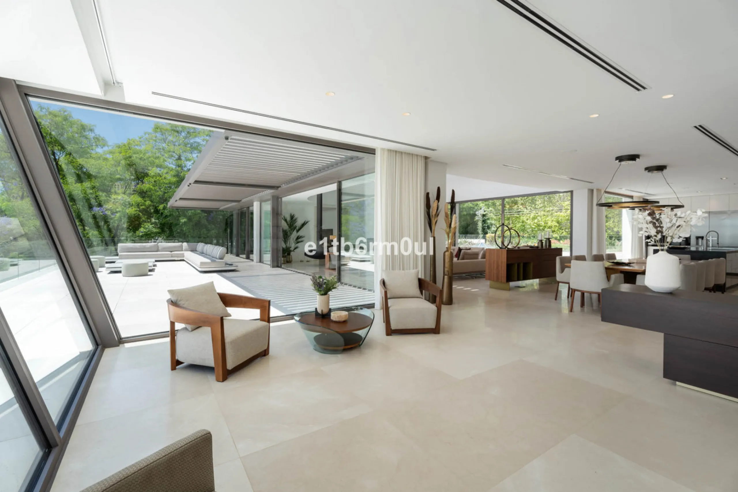 Experience the pinnacle of modern Mediterranean architecture with this brand-new designer villa nestled in the prestigious La Quinta residential enclave of Benahavís. Offering breathtaking panoramic sea and golf course views, this exquisitely crafted home