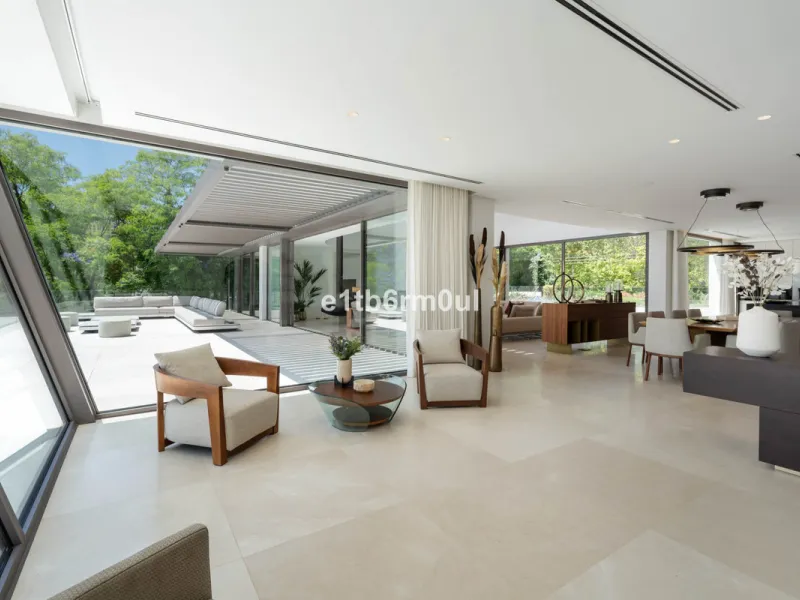 Experience the pinnacle of modern Mediterranean architecture with this brand-new designer villa nestled in the prestigious La Quinta residential enclave of Benahavís. Offering breathtaking panoramic sea and golf course views, this exquisitely crafted home