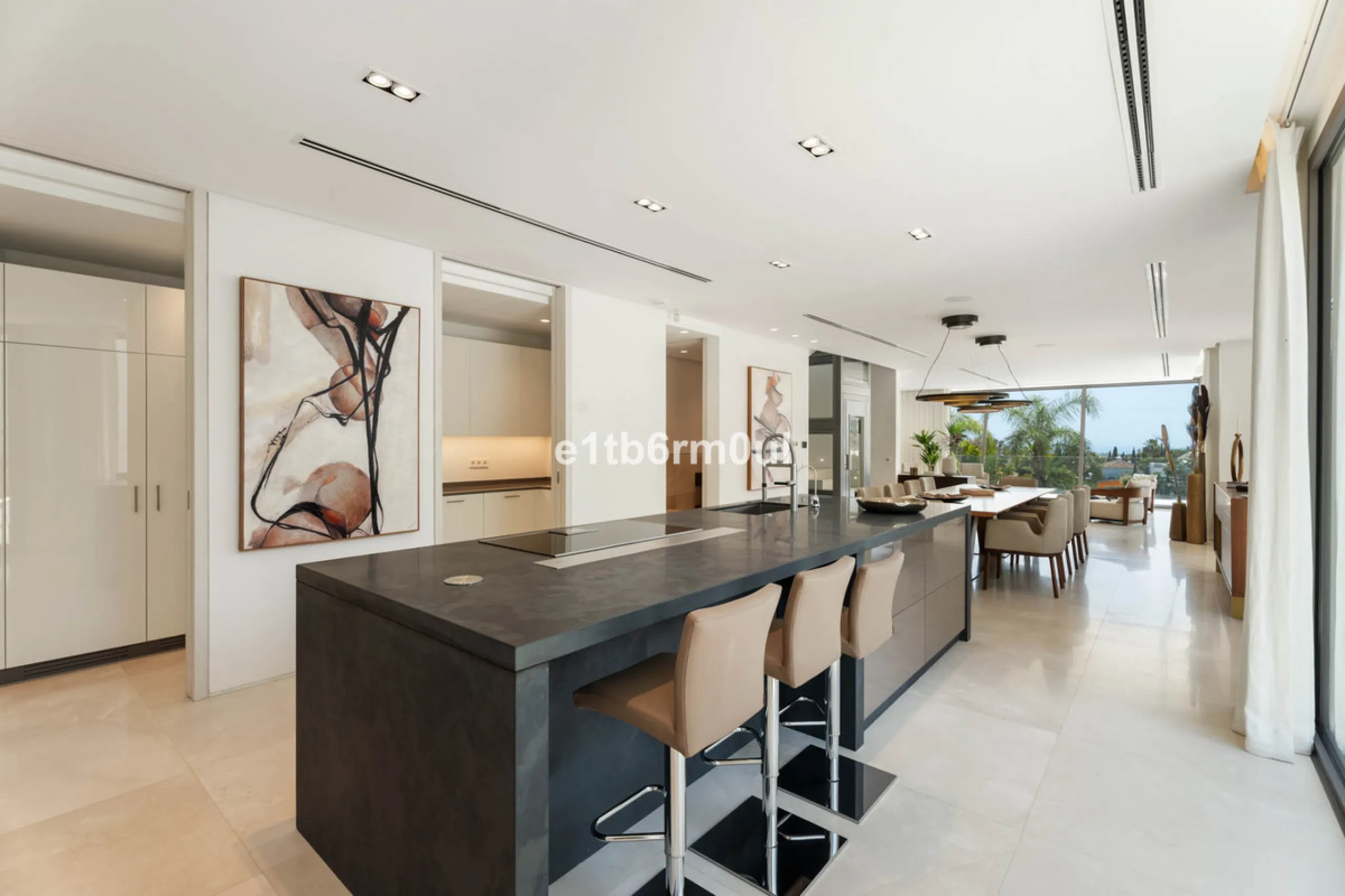 Experience the pinnacle of modern Mediterranean architecture with this brand-new designer villa nestled in the prestigious La Quinta residential enclave of Benahavís. Offering breathtaking panoramic sea and golf course views, this exquisitely crafted home