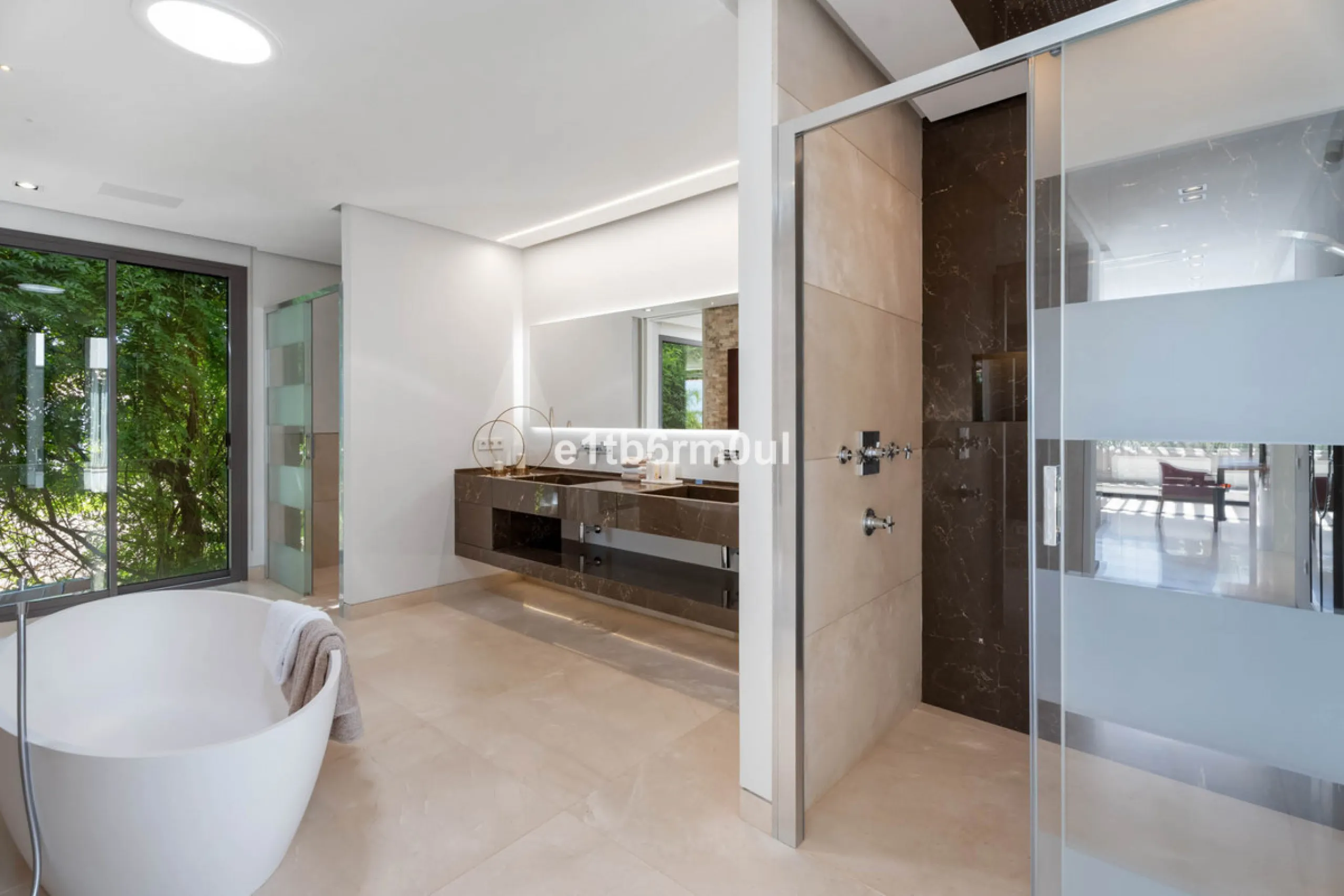 Experience the pinnacle of modern Mediterranean architecture with this brand-new designer villa nestled in the prestigious La Quinta residential enclave of Benahavís. Offering breathtaking panoramic sea and golf course views, this exquisitely crafted home