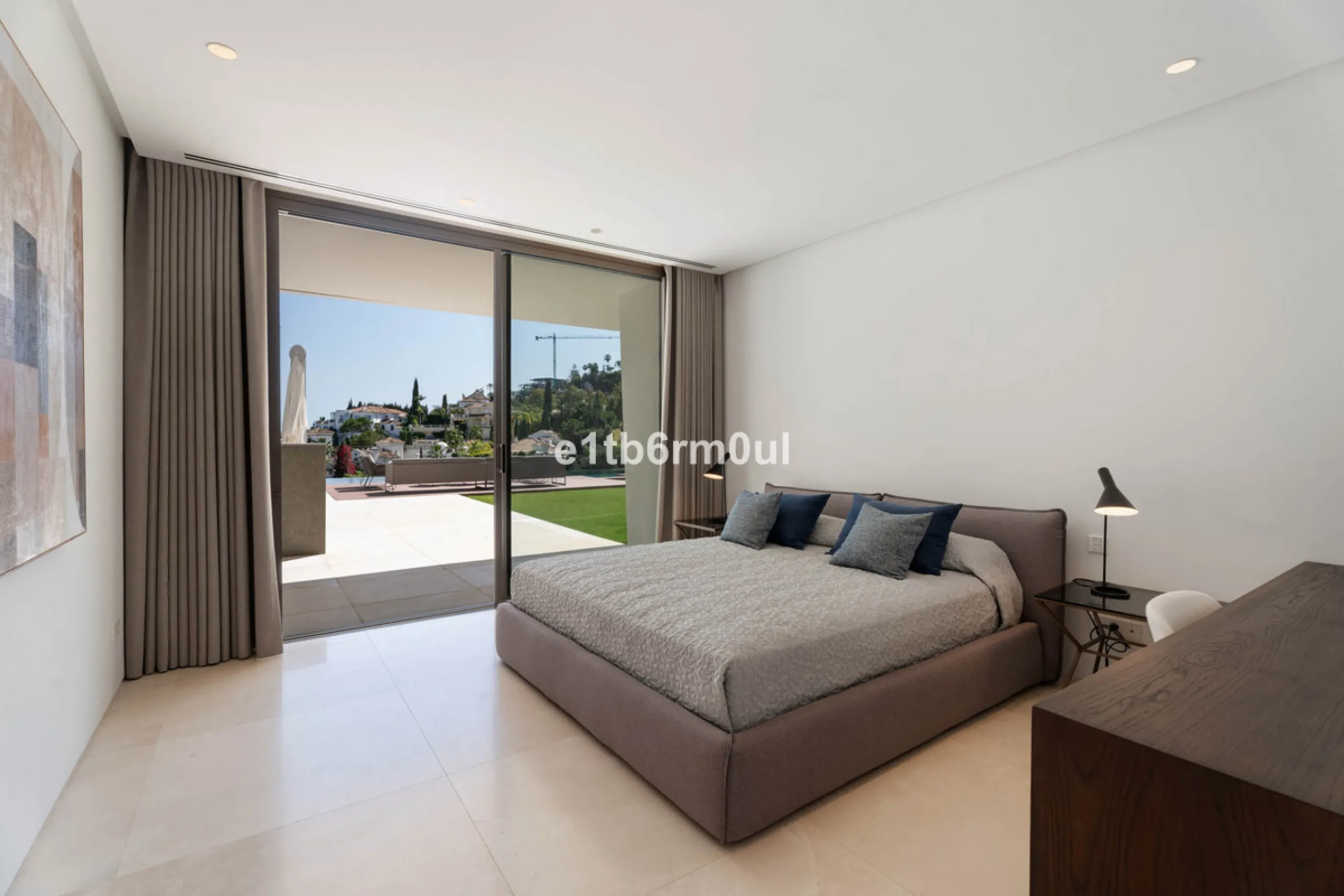 Experience the pinnacle of modern Mediterranean architecture with this brand-new designer villa nestled in the prestigious La Quinta residential enclave of Benahavís. Offering breathtaking panoramic sea and golf course views, this exquisitely crafted home