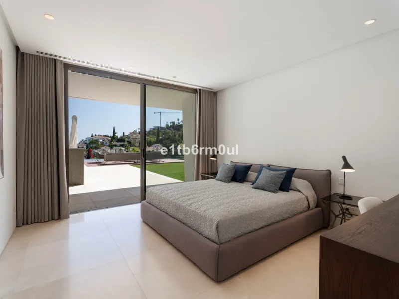Experience the pinnacle of modern Mediterranean architecture with this brand-new designer villa nestled in the prestigious La Quinta residential enclave of Benahavís. Offering breathtaking panoramic sea and golf course views, this exquisitely crafted home