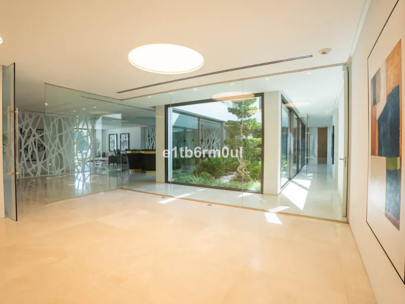 Experience the pinnacle of modern Mediterranean architecture with this brand-new designer villa nestled in the prestigious La Quinta residential enclave of Benahavís. Offering breathtaking panoramic sea and golf course views, this exquisitely crafted home