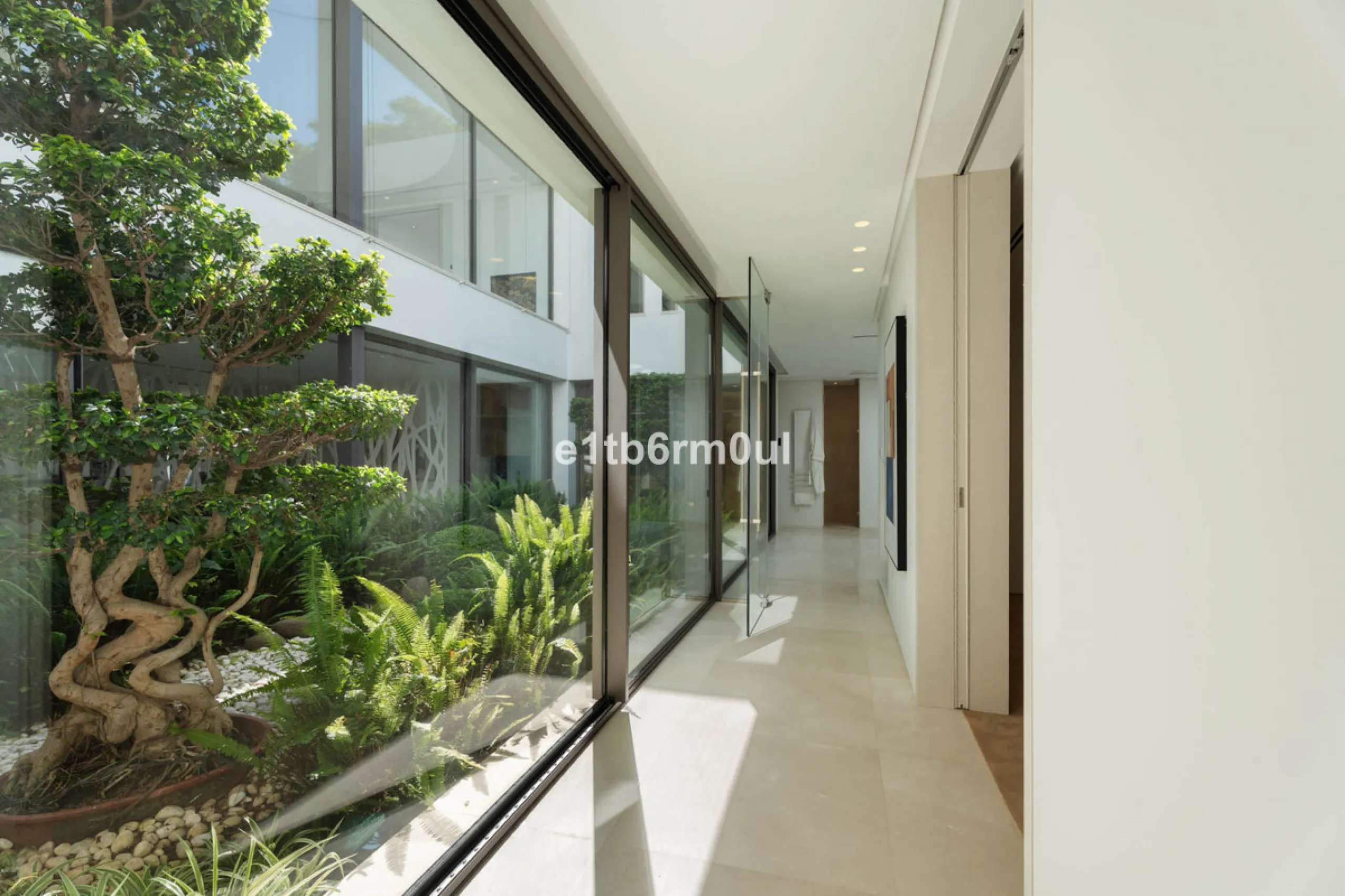 Experience the pinnacle of modern Mediterranean architecture with this brand-new designer villa nestled in the prestigious La Quinta residential enclave of Benahavís. Offering breathtaking panoramic sea and golf course views, this exquisitely crafted home