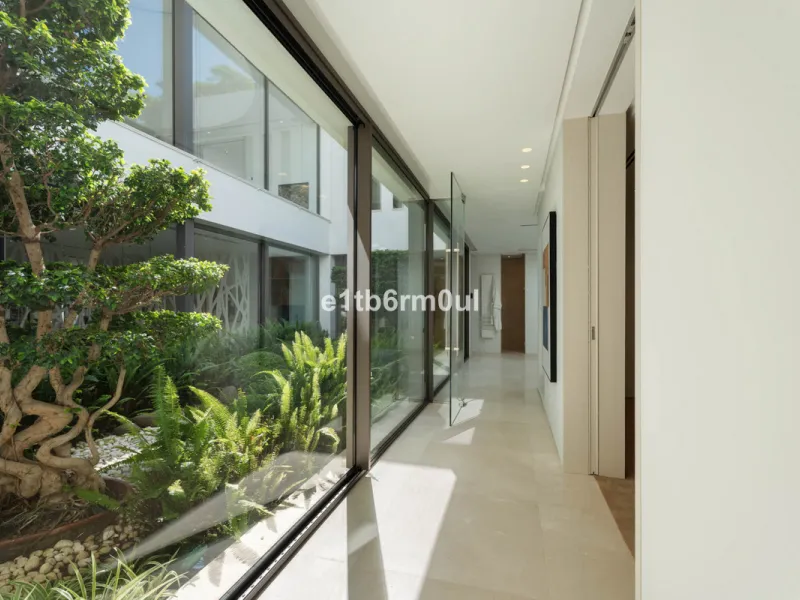 Experience the pinnacle of modern Mediterranean architecture with this brand-new designer villa nestled in the prestigious La Quinta residential enclave of Benahavís. Offering breathtaking panoramic sea and golf course views, this exquisitely crafted home