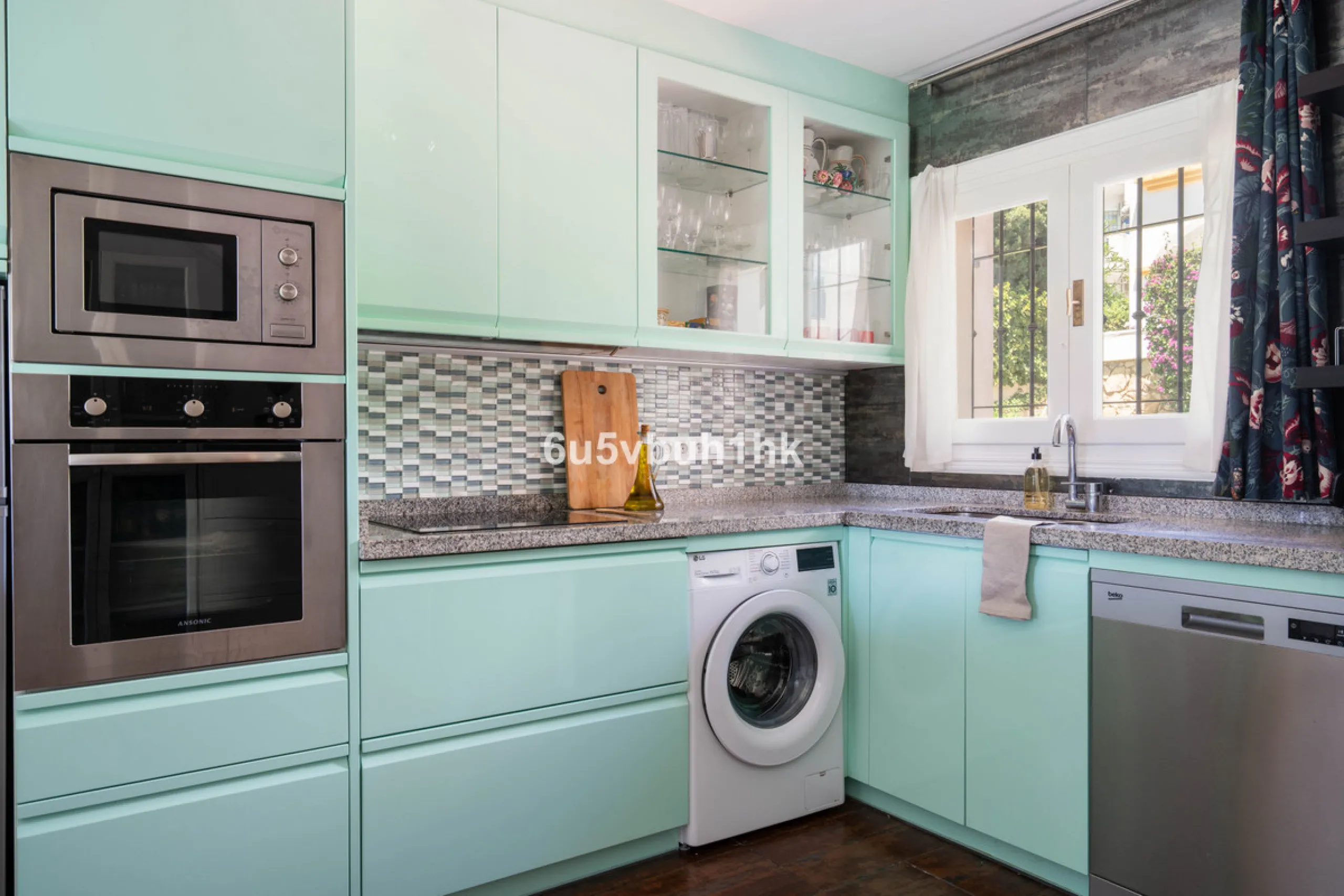 Welcome to a charming townhouse set right on the golf course in Mijas, surrounded by nature, peace, and Andalusian charm. This beautifully maintained home offers a private garden with open green views, backing directly onto a well-kept golf area, ideal fo
