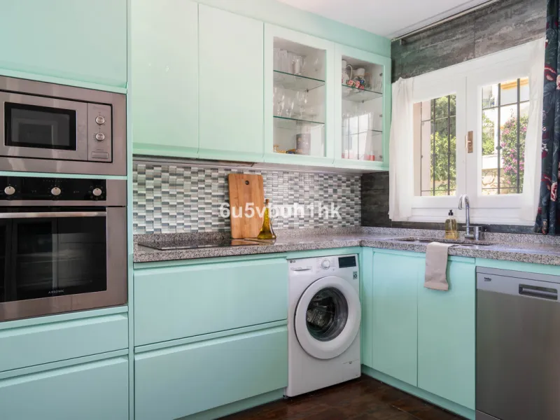 Welcome to a charming townhouse set right on the golf course in Mijas, surrounded by nature, peace, and Andalusian charm. This beautifully maintained home offers a private garden with open green views, backing directly onto a well-kept golf area, ideal fo