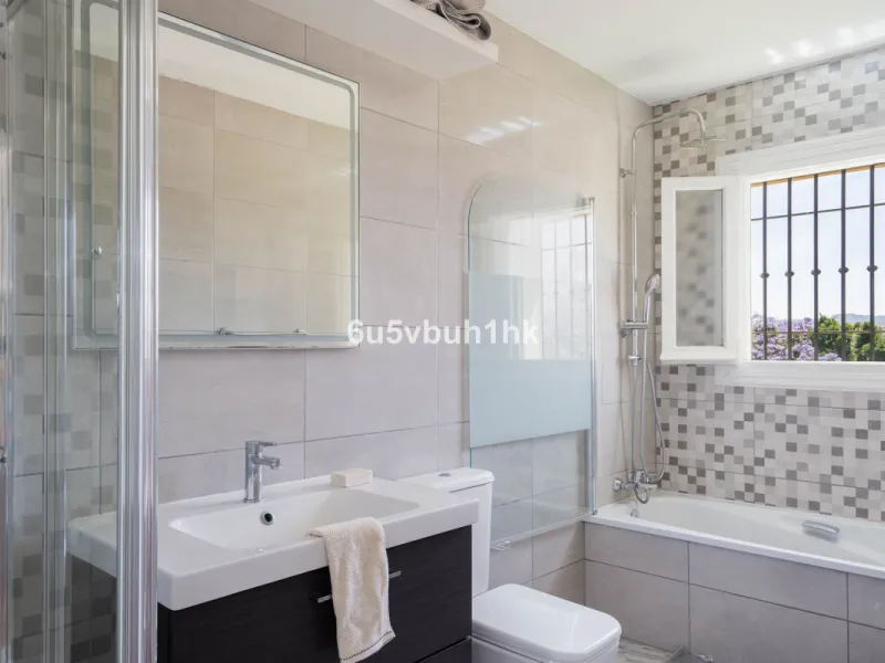 Welcome to a charming townhouse set right on the golf course in Mijas, surrounded by nature, peace, and Andalusian charm. This beautifully maintained home offers a private garden with open green views, backing directly onto a well-kept golf area, ideal fo
