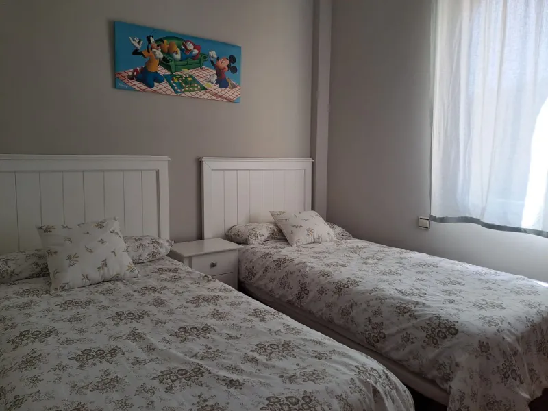 Welcome to this stunning 2-bedroom, 2-bathroom apartment, perfectly situated in a gated community that offers both comfort and convenience. As you step inside, a small hallway leads you to a spacious open-plan living room that connects to a grand solarium