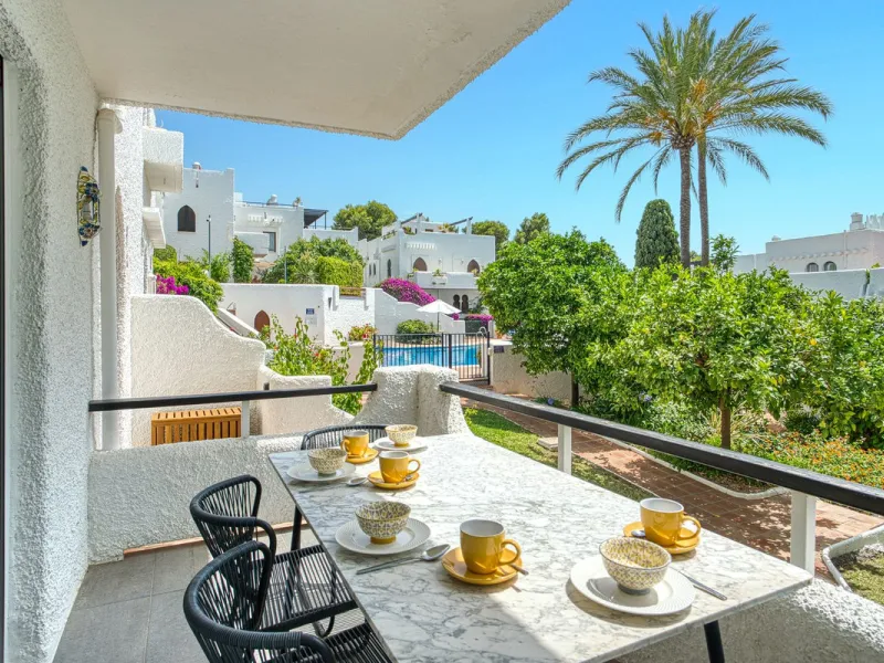 Elegant 3-Bedroom Townhouse with Golf & Mountain Views in Gated Nueva Andalucía Community