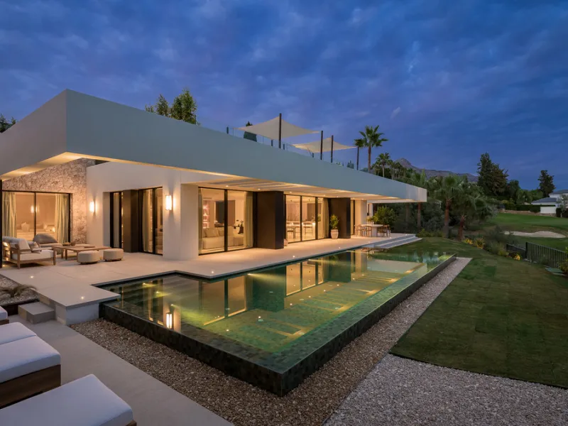 Nestled within the prestigious Los Naranjos Country Club in Nueva Andalucia, Marbella, this luxurious villa epitomises modern elegance and sophistication. Spanning an impressive built area of 685m² on a 960m² plot, this brand-new property offers an unpara